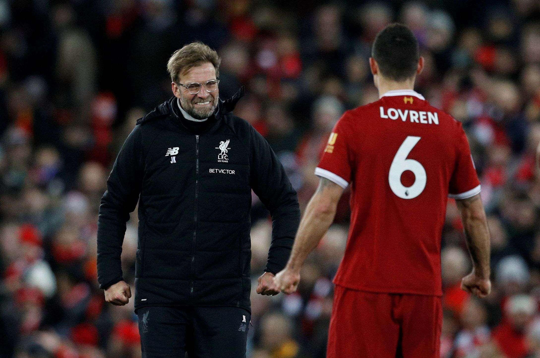Soccer Football - Premier League - Liverpool vs Leicester City - Anfield, Liverpool, Britain - December 30, 2017   Liverpool manager Juergen Klopp celebrates with Dejan Lovren after the match     REUTERS/Phil Noble    EDITORIAL USE ONLY. No use with unauthorized audio, video, data, fixture lists, club/league logos or 