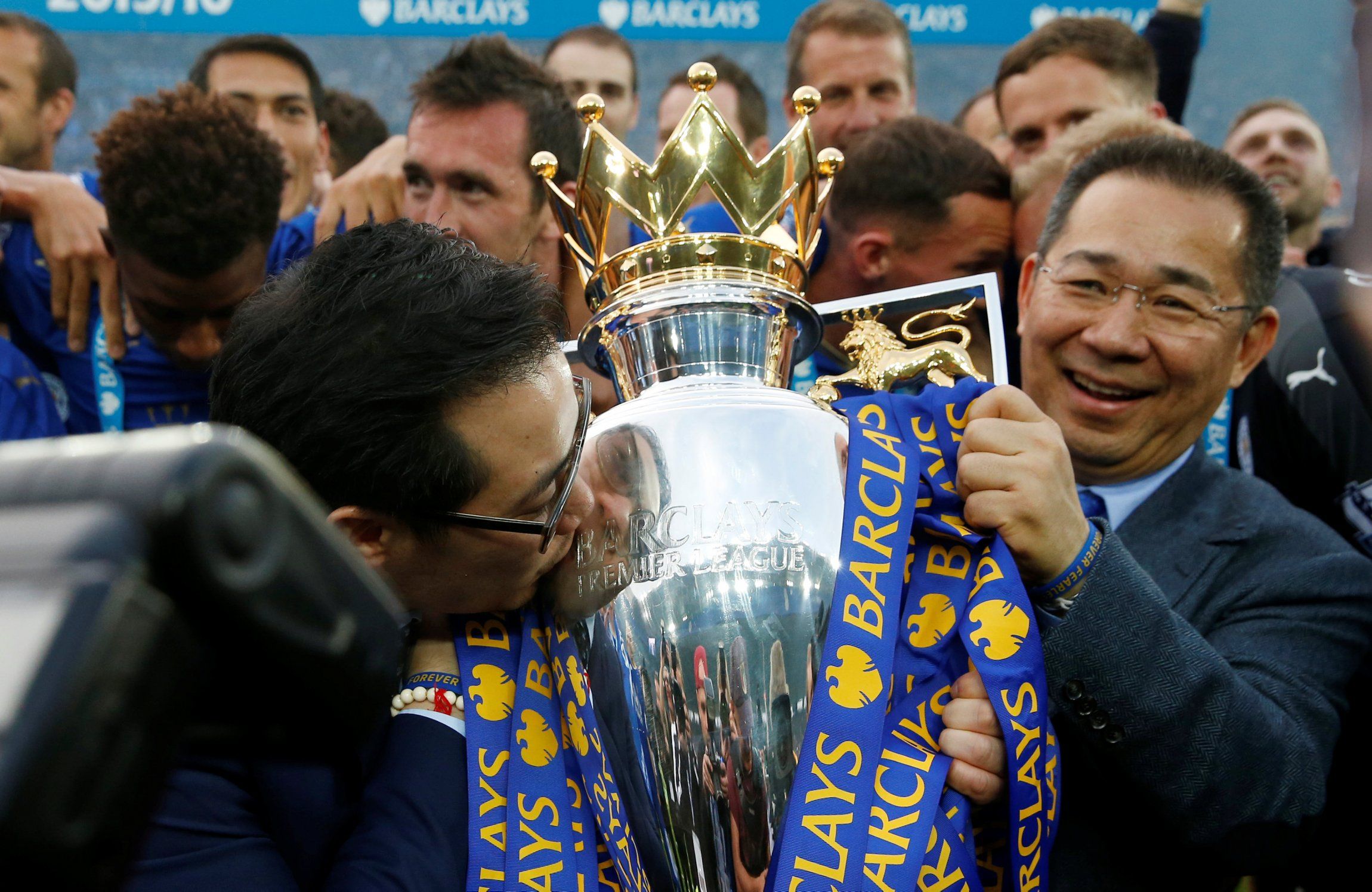 Khun Vichai and son with Premier League title