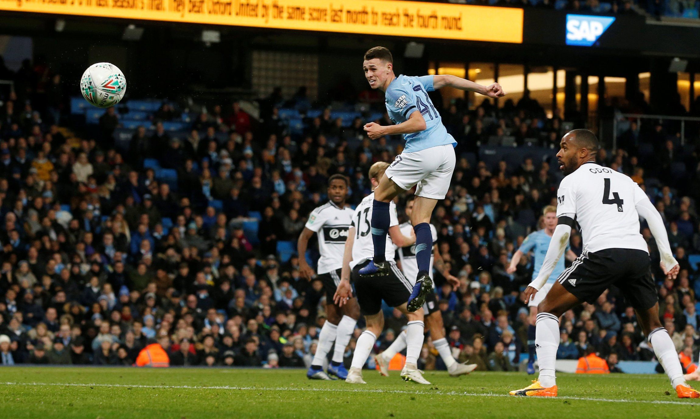 Manchester City's Phil Foden heads at goal vs Fulham in Carabao Cup