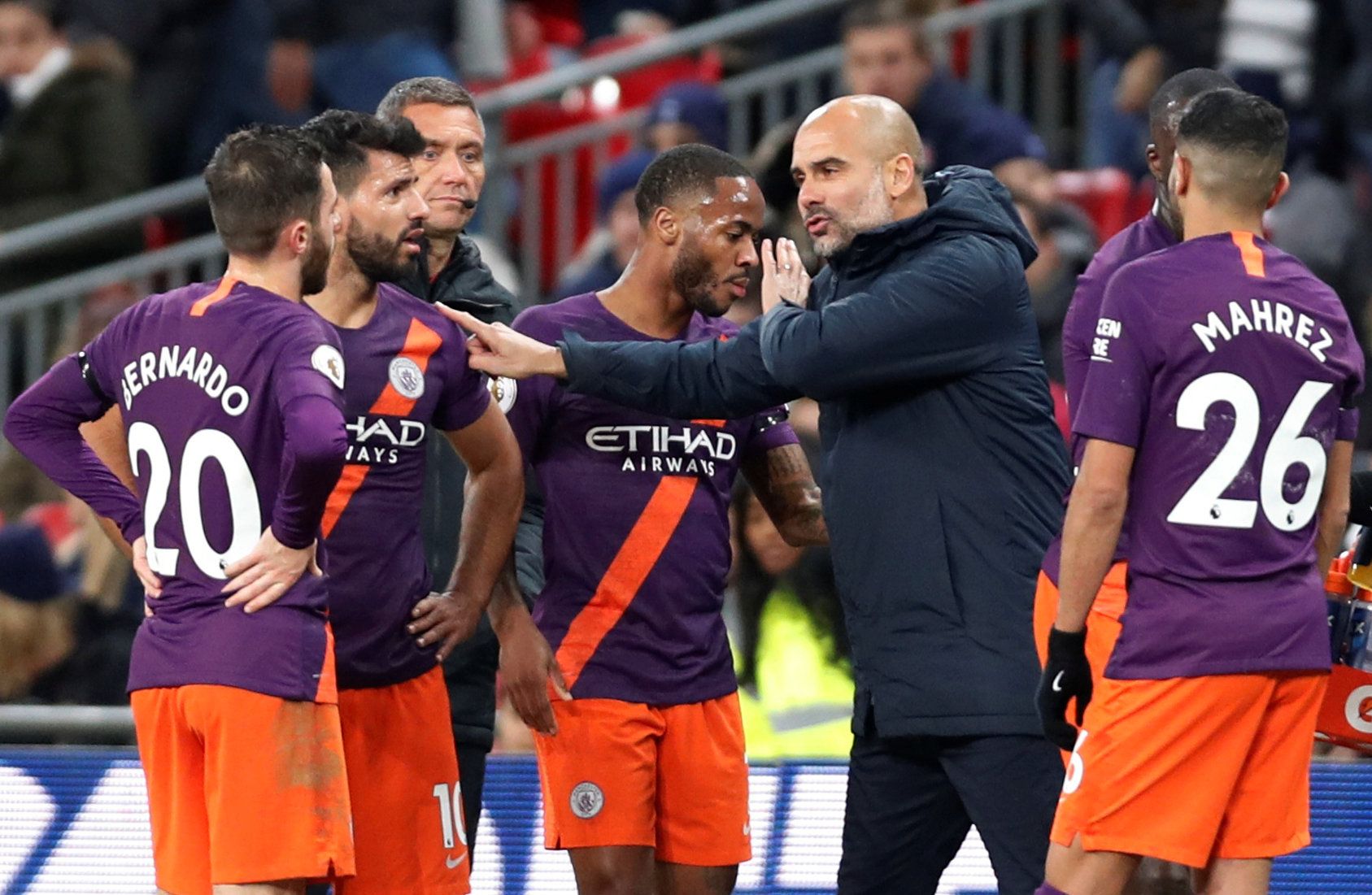 Pep Guardiola talks to his team (Spurs v Manchester City)