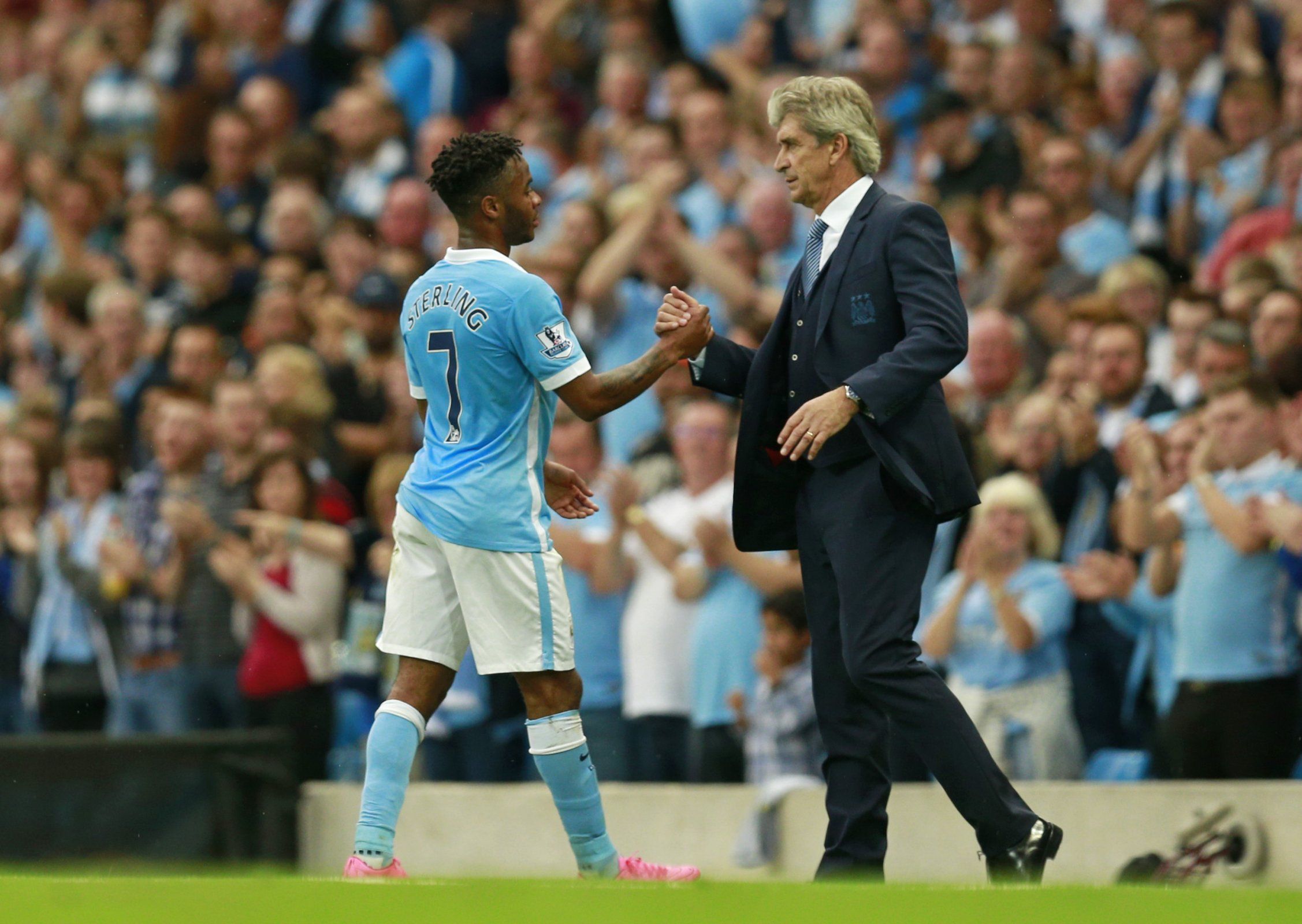 Manuel Pellegrini with Raheem Sterling at Manchester City