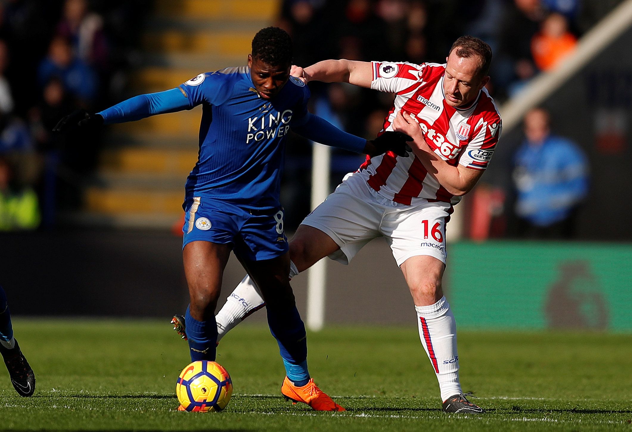 Soccer Football - Premier League - Leicester City vs Stoke City - King Power Stadium, Leicester, Britain - February 24, 2018   Leicester City's Kelechi Iheanacho in action with Stoke City's Charlie Adam    Action Images via Reuters/Andrew Boyers    EDITORIAL USE ONLY. No use with unauthorized audio, video, data, fixture lists, club/league logos or 