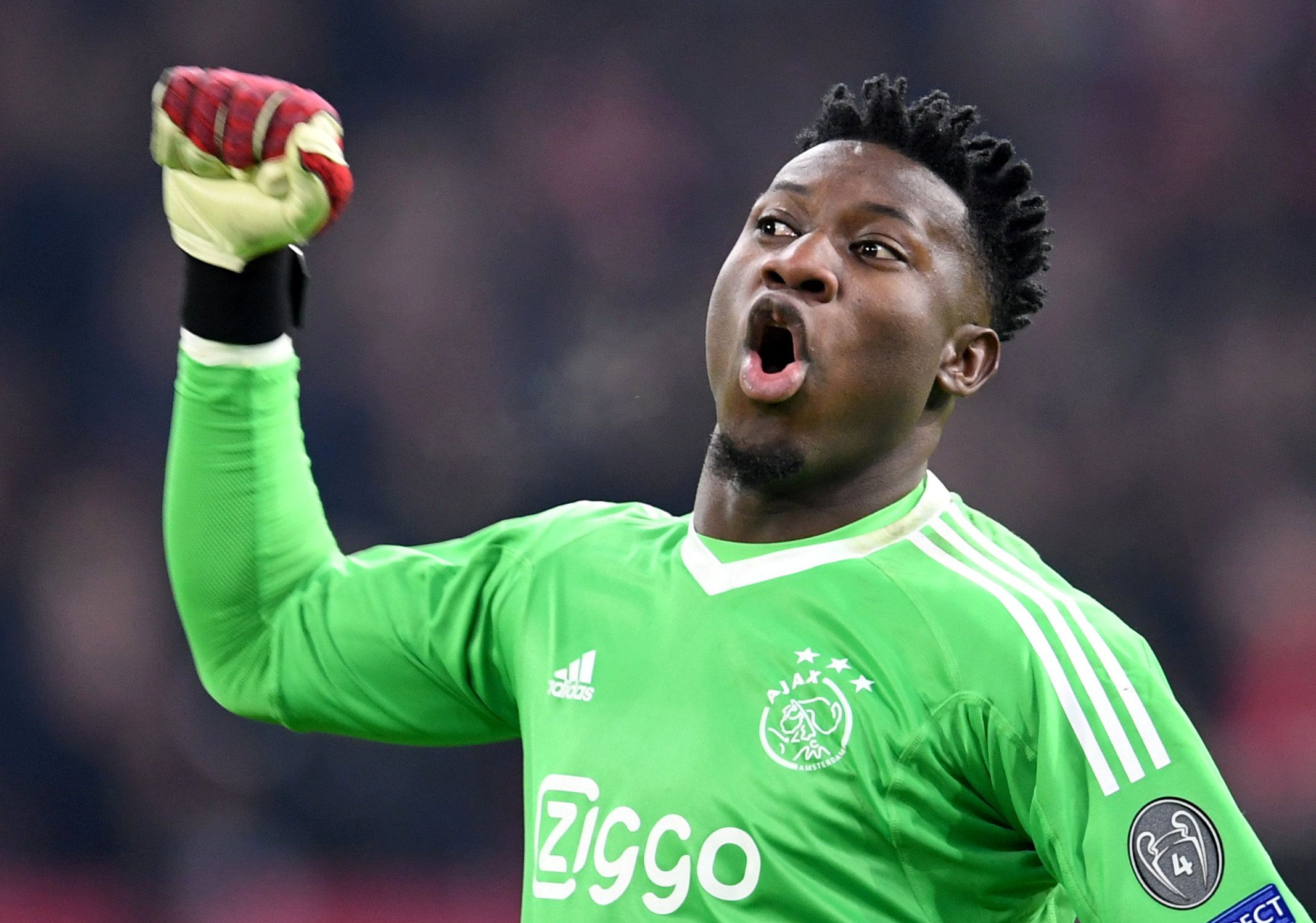 Soccer Football - Champions League - Group Stage - Group E - Ajax Amsterdam v Bayern Munich -  Johan Cruijff Arena, Amsterdam, Netherlands - December 12, 2018  Ajax's Andre Onana celebrates their second goal scored by Dusan Tadic          REUTERS/Toussaint Kluiters     TPX IMAGES OF THE DAY