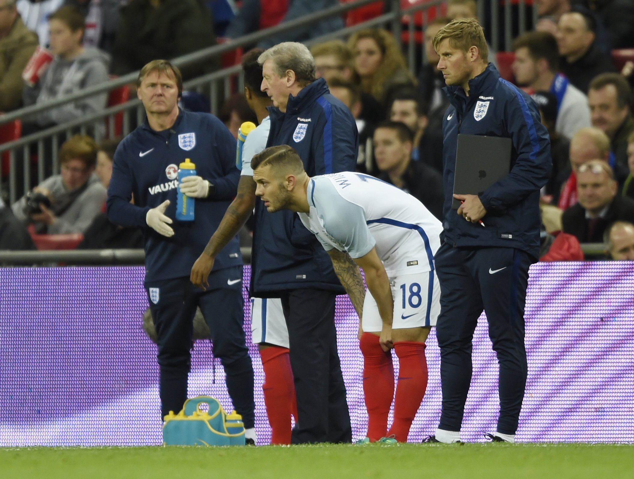 Jack Wilshere prepares to come on for England