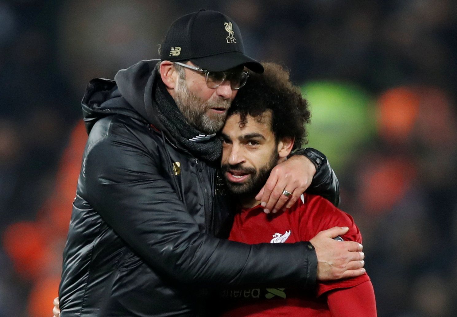 Jurgen Klopp hugs Mohamed Salah