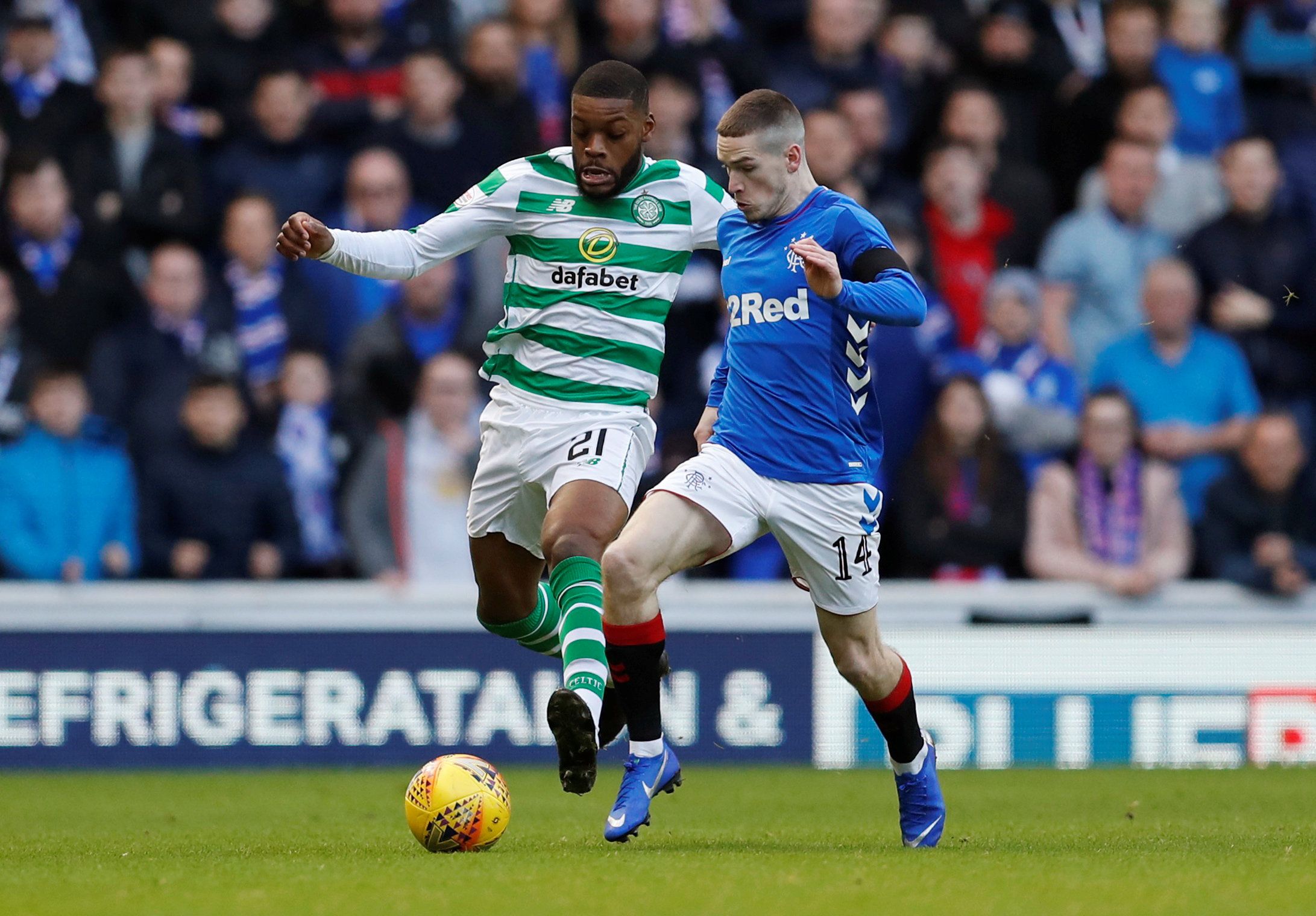 Soccer Football - Scottish Premiership - Rangers v Celtic - Ibrox, Glasgow, Britain - December 29, 2018  Celtic's Olivier Ntcham in action with Rangers' Ryan Kent      REUTERS/Russell Cheyne