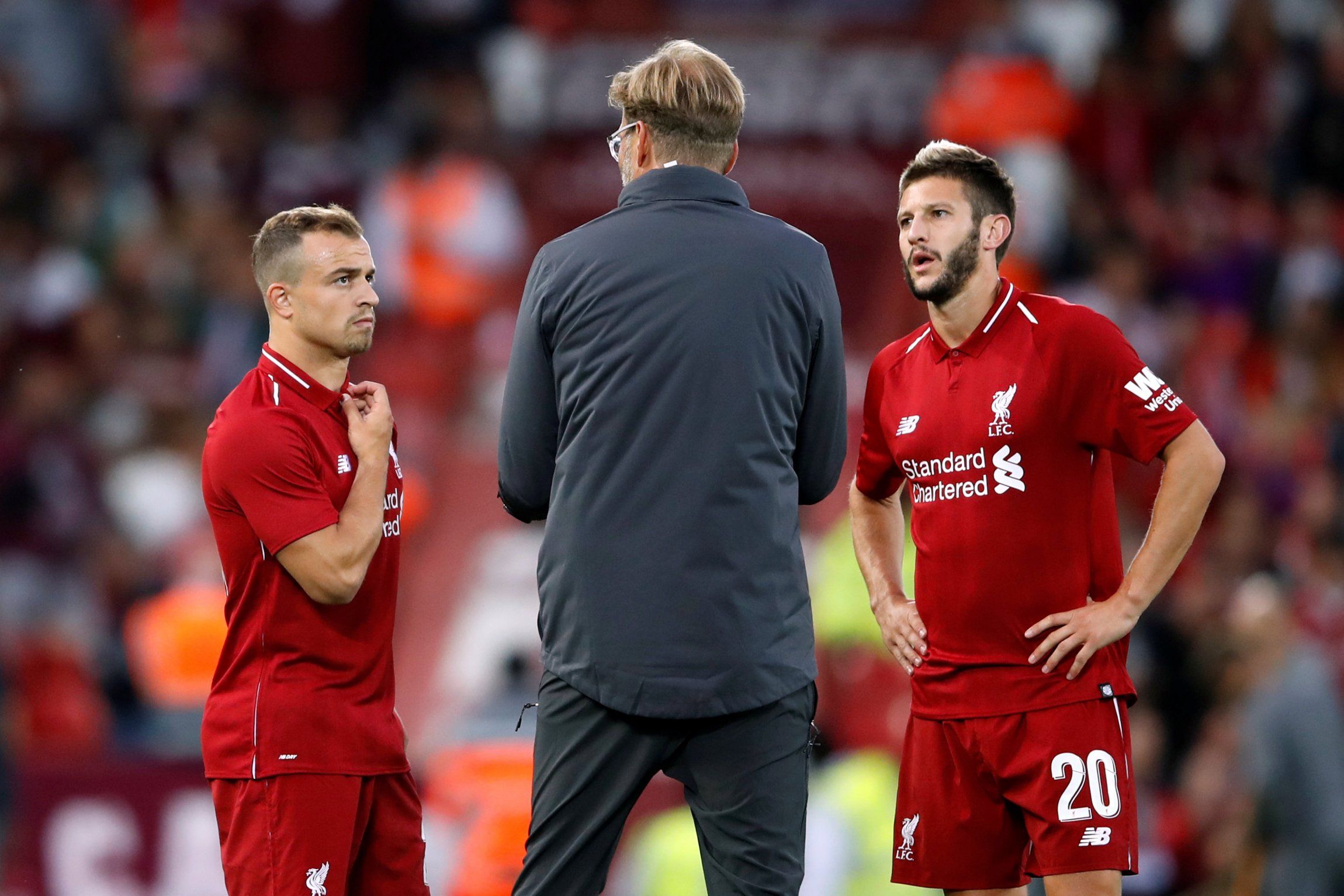 Liverpool manager Jurgen Klopp instructing Adam Lallana and Xherdan Shaqiri