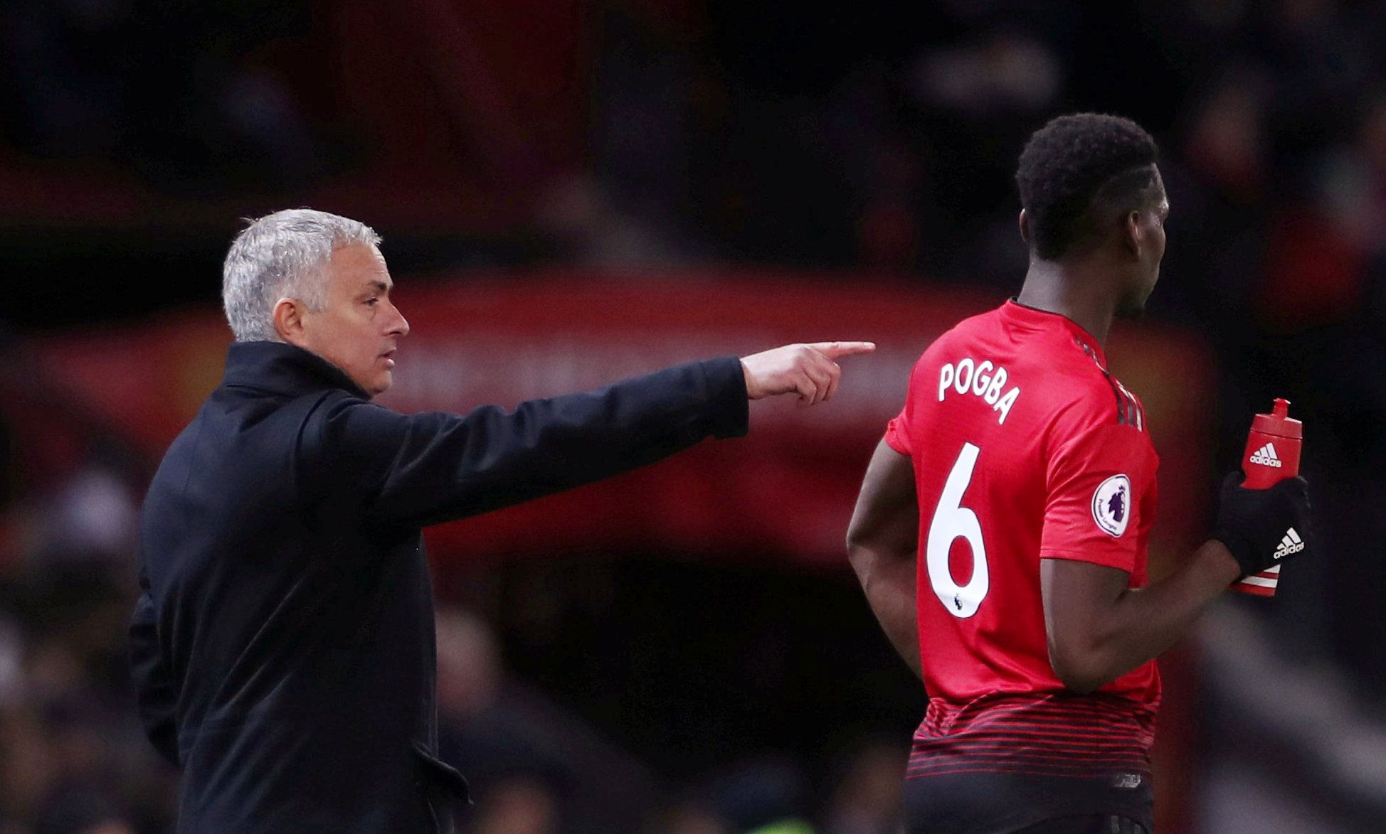 FILE PHOTO: Soccer Football - Premier League - Manchester United v Everton - Old Trafford, Manchester, Britain - October 28, 2018  Manchester United manager Jose Mourinho and Paul Pogba during the match  Action Images via Reuters/Lee Smith/File Photo  EDITORIAL USE ONLY. No use with unauthorized audio, video, data, fixture lists, club/league logos or 