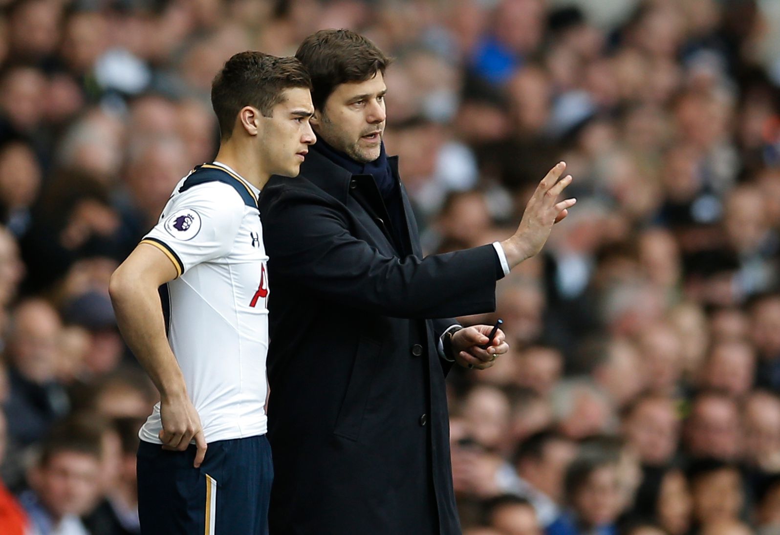 Britain Soccer Football - Tottenham Hotspur v Southampton - Premier League - White Hart Lane - 19/3/17 Tottenham manager Mauricio Pochettino speaks with Harry Winks before he comes on as a substitute Action Images via Reuters / Andrew Couldridge Livepic EDITORIAL USE ONLY. No use with unauthorized audio, video, data, fixture lists, club/league logos or 