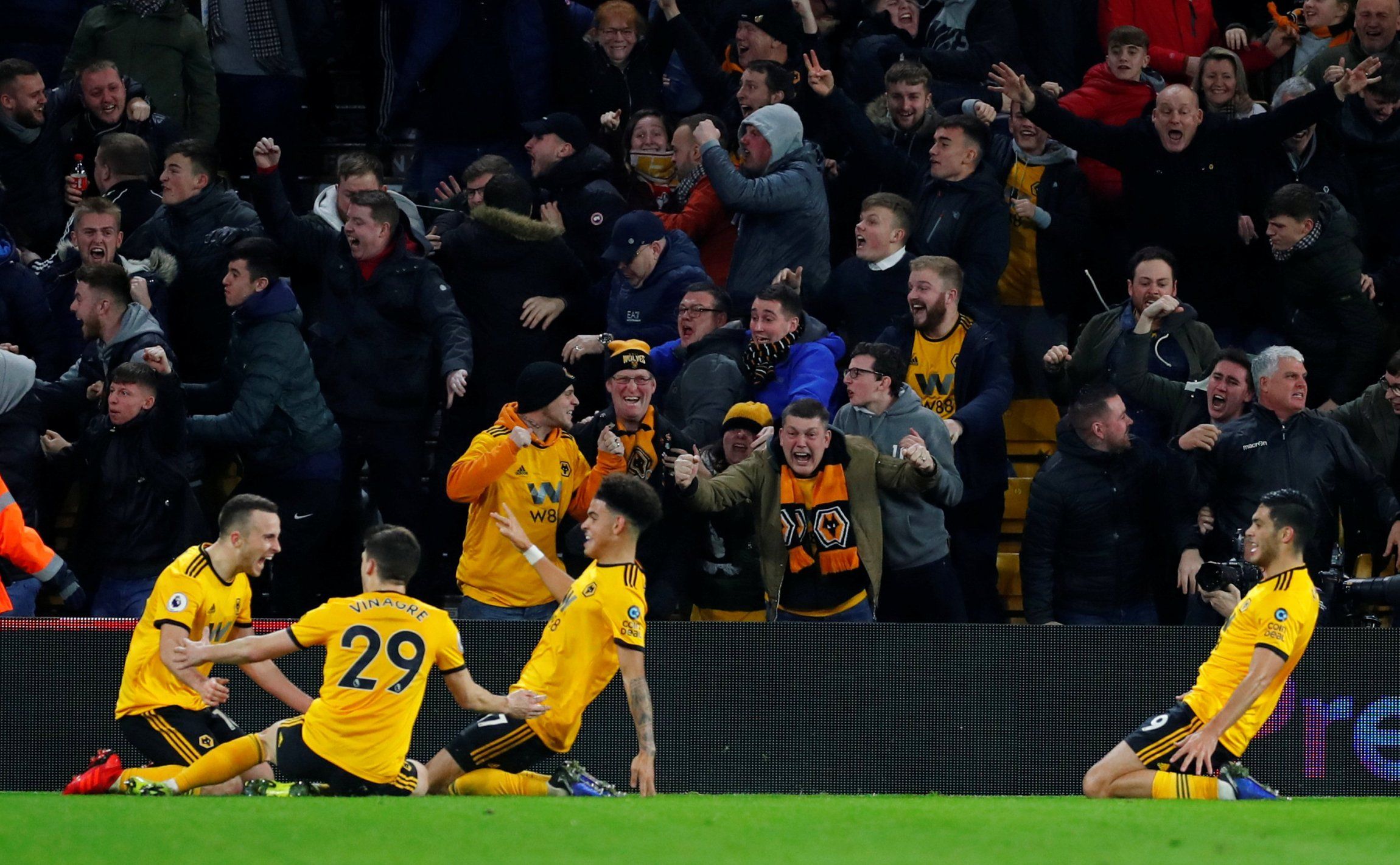 Wolverhampton Wanderers' fans and Diogo Jota celebrates scoring their second goal v Chelsea
