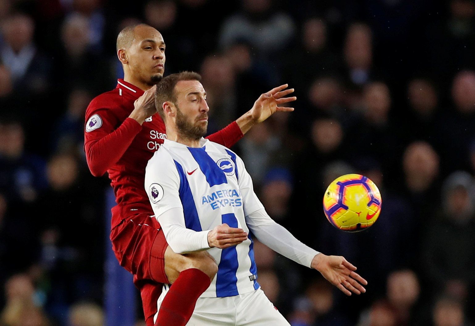 Soccer Football - Premier League - Brighton &amp; Hove Albion v Liverpool - The American Express Community Stadium, Brighton, Britain - January 12, 2019  Brighton's Glenn Murray in action with Liverpool's Fabinho   Action Images via Reuters/Paul Childs  EDITORIAL USE ONLY. No use with unauthorized audio, video, data, fixture lists, club/league logos or 