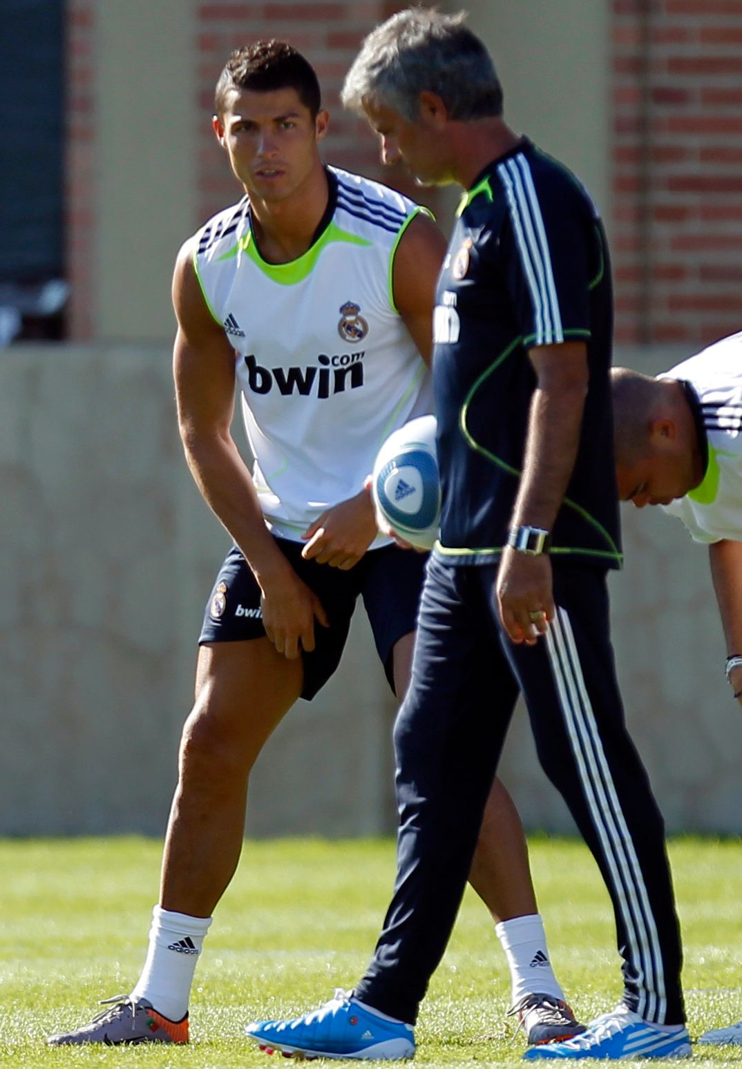 Real Madrid coach Mourinho talks to forward Ronaldo during training in Los Angeles