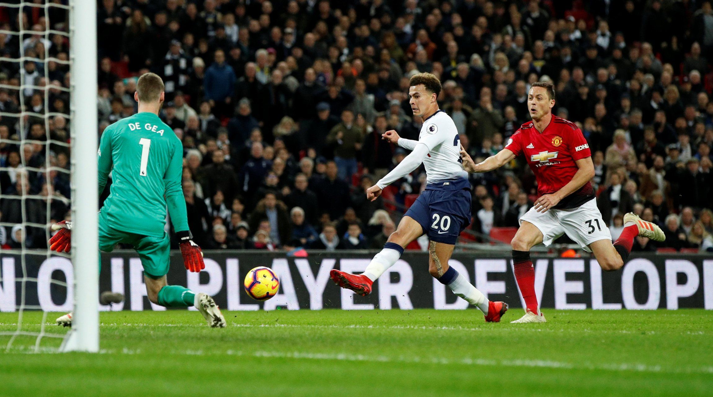 Manchester United's David de Gea makes a save from Tottenham's Dele Alli