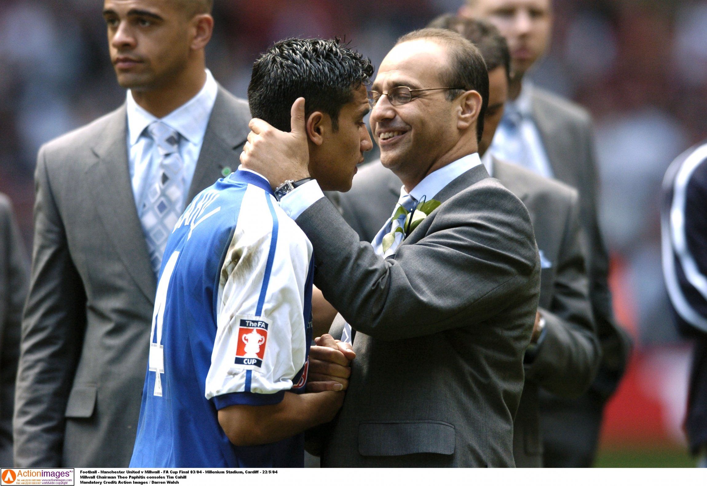 Tim Cahill is hugged after losing FA Cup final
