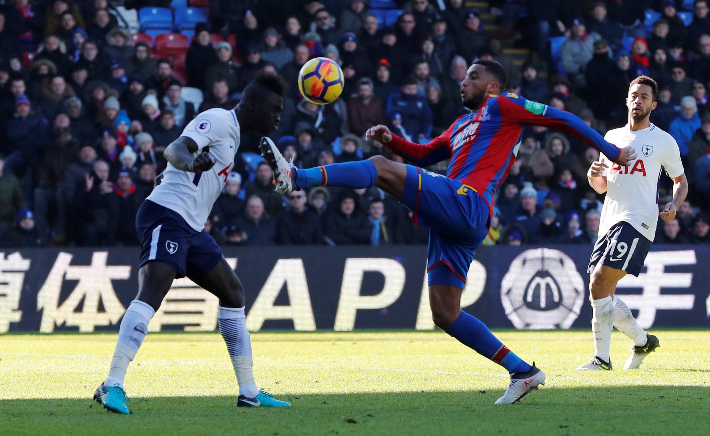 Tottenham’s Davinson Sanchez in action with Crystal Palace’s Jairo Riedewald
