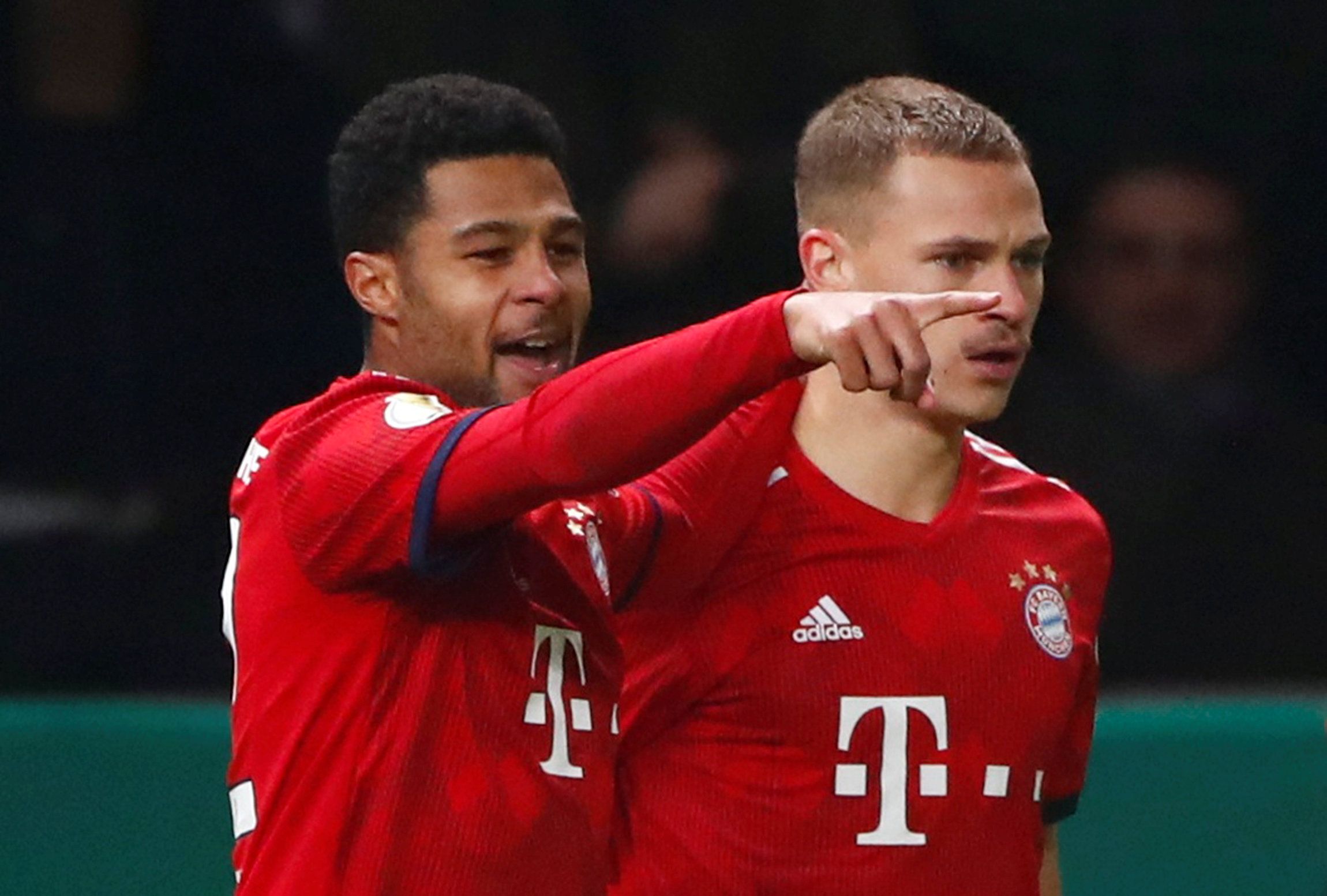 Soccer Football - DFB Cup - Third Round - Hertha BSC v Bayern Munich - Olympiastadion, Berlin, Germany - February 6, 2019  Bayern Munich's Serge Gnabry celebrates scoring their second goal with Joshua Kimmich   REUTERS/Hannibal Hanschke  DFB regulations prohibit any use of photographs as image sequences and/or quasi-video