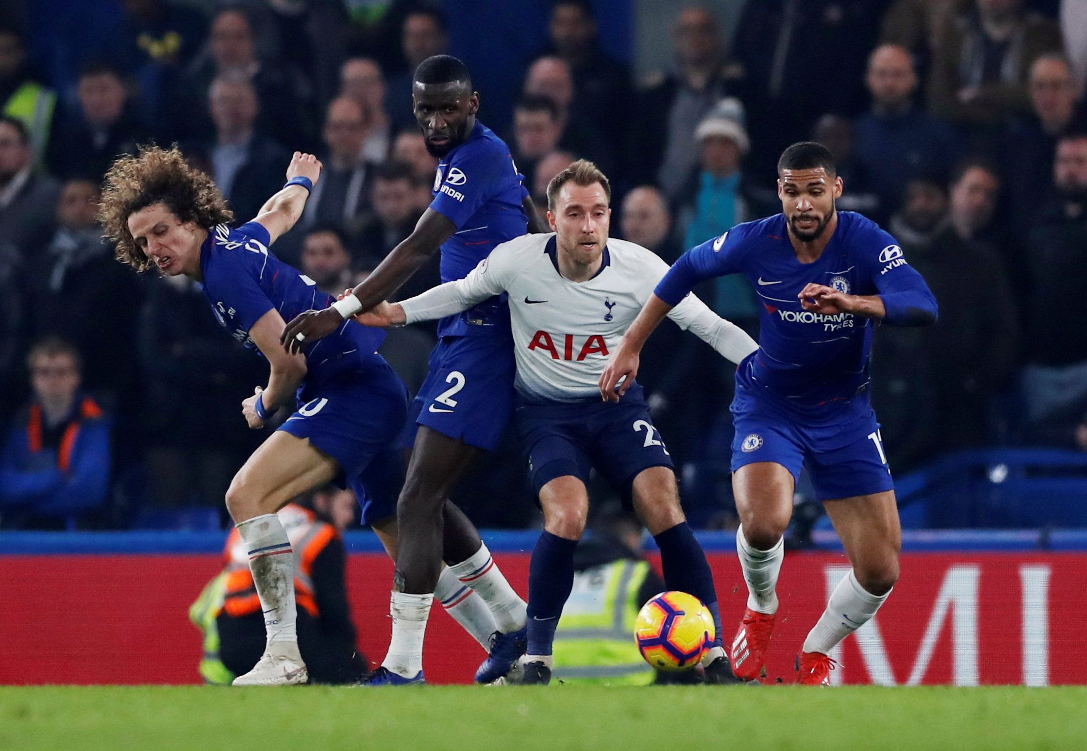 Soccer Football - Premier League - Chelsea v Tottenham Hotspur - Stamford Bridge, London, Britain - February 27, 2019  Tottenham's Christian Eriksen in action with Chelsea's David Luiz, Antonio Rudiger and Ruben Loftus-Cheek   Action Images via Reuters/Paul Childs  EDITORIAL USE ONLY. No use with unauthorized audio, video, data, fixture lists, club/league logos or "live" services. Online in-match use limited to 75 images, no video emulation. No use in betting, games or single club/league/player 