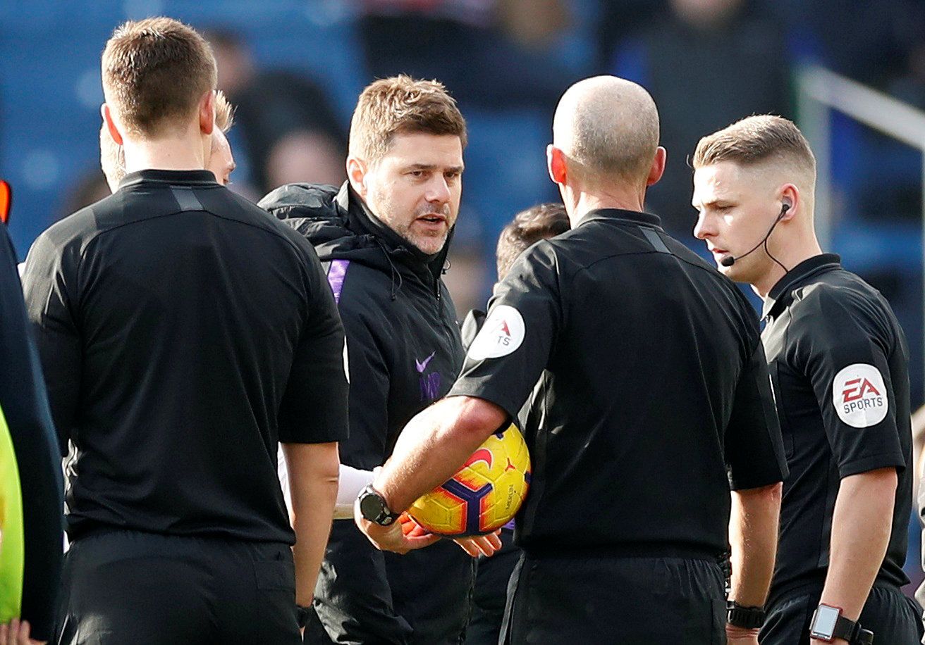 Soccer Football - Premier League - Burnley v Tottenham Hotspur - Turf Moor, Burnley, Britain - February 23, 2019  Tottenham manager Mauricio Pochettino remonstrates with referee Mike Dean after the match          Action Images via Reuters/Carl Recine  EDITORIAL USE ONLY. No use with unauthorized audio, video, data, fixture lists, club/league logos or "live" services. Online in-match use limited to 75 images, no video emulation. No use in betting, games or single club/league/player publications. 