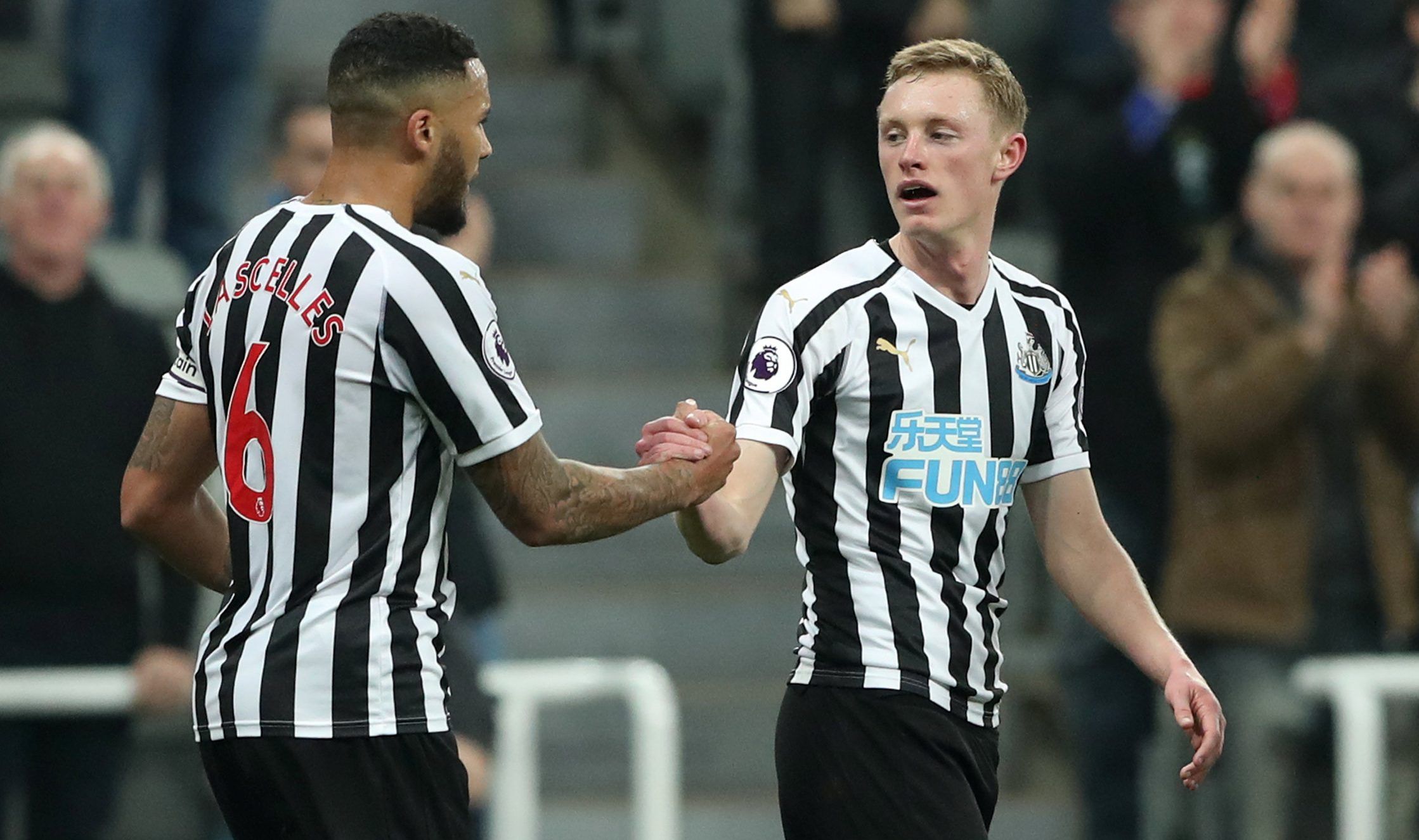 Soccer Football - Premier League - Newcastle United v Burnley - St James' Park, Newcastle, Britain - February 26, 2019  Newcastle United's Sean Longstaff celebrates scoring their second goal with Jamaal Lascelles          REUTERS/Scott Heppell  EDITORIAL USE ONLY. No use with unauthorized audio, video, data, fixture lists, club/league logos or 