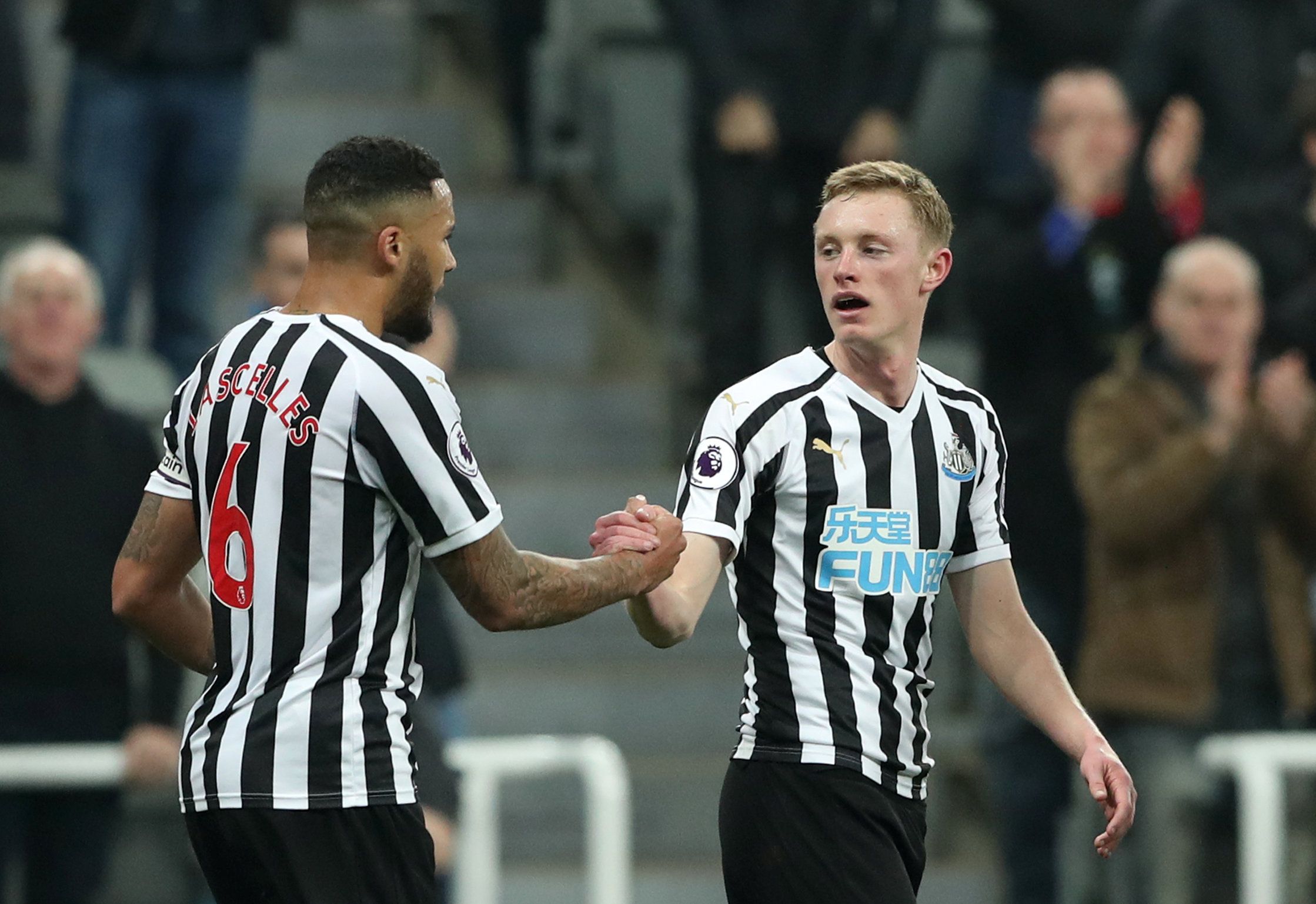 Soccer Football - Premier League - Newcastle United v Burnley - St James' Park, Newcastle, Britain - February 26, 2019  Newcastle United's Sean Longstaff celebrates scoring their second goal with Jamaal Lascelles          REUTERS/Scott Heppell  EDITORIAL USE ONLY. No use with unauthorized audio, video, data, fixture lists, club/league logos or "live" services. Online in-match use limited to 75 images, no video emulation. No use in betting, games or single club/league/player publications.  Please