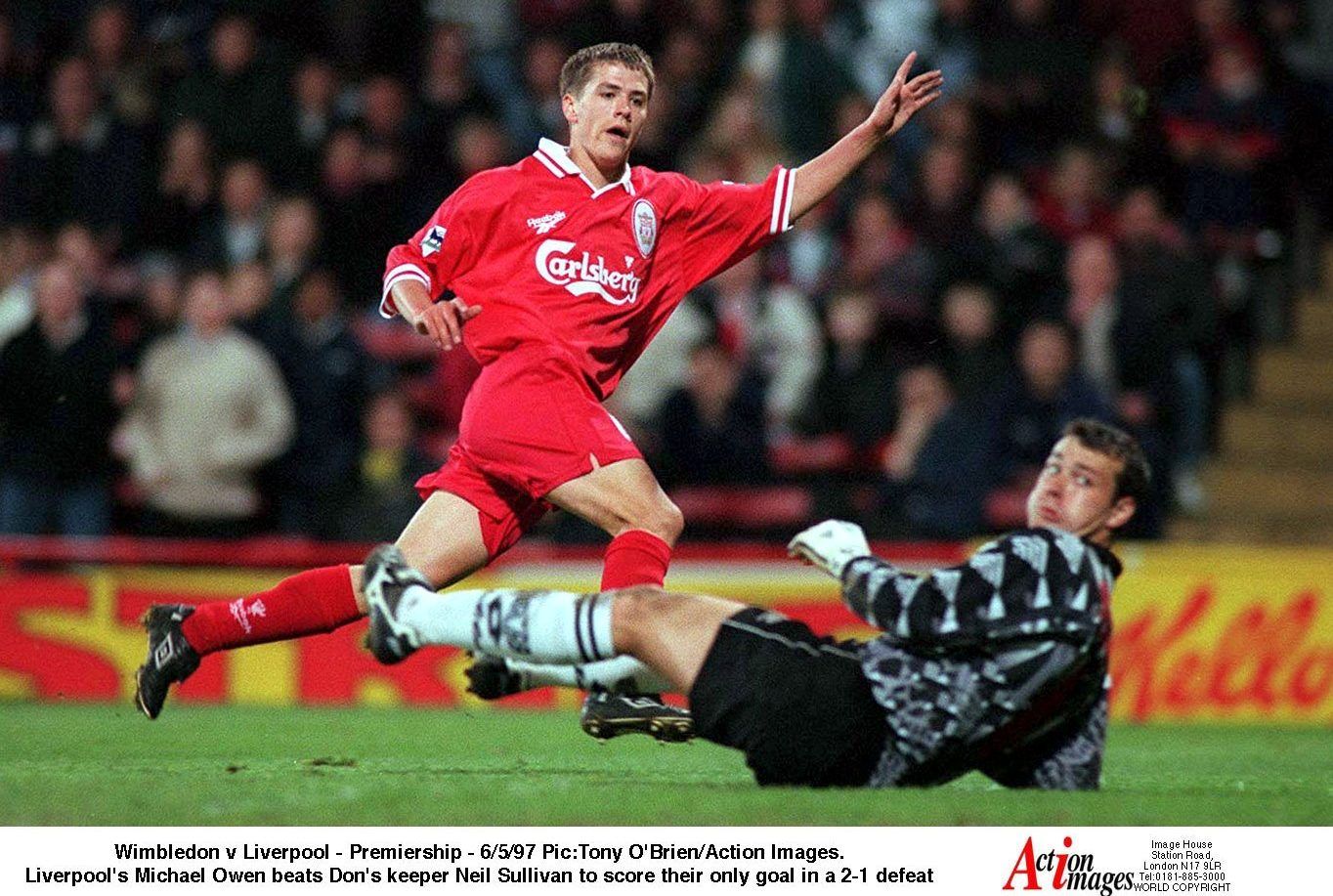 Wimbledon v Liverpool - Premiership - 6/5/97 Pic:Tony O'Brien/Action Images. 
Liverpool's Michael Owen beats Don's keeper Neil Sullivan to score their only goal in a 2-1 defeat