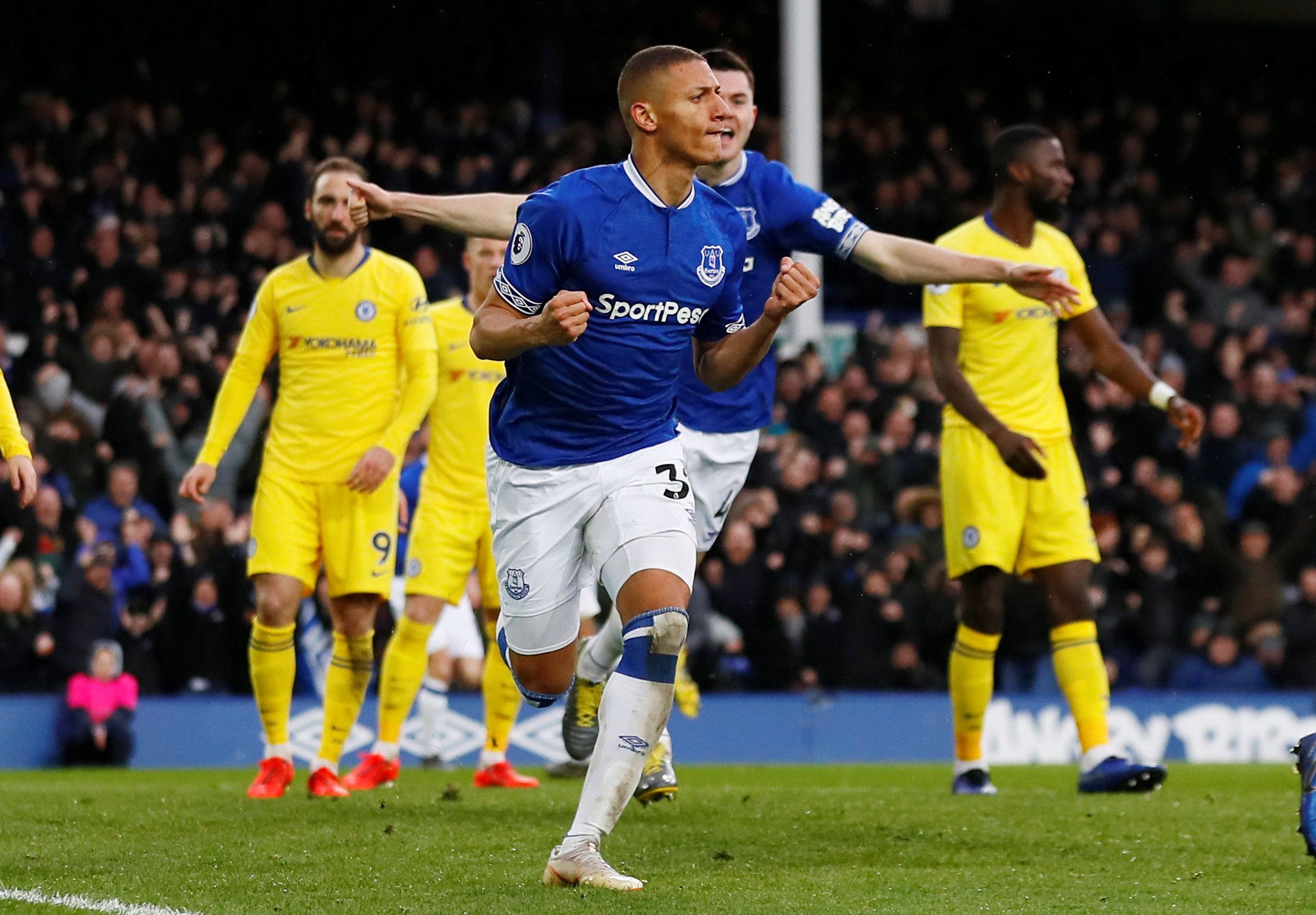 Soccer Football - Premier League - Everton v Chelsea - Goodison Park, Liverpool, Britain - March 17, 2019  Everton's Richarlison celebrates scoring their first goal  Action Images via Reuters/Jason Cairnduff  EDITORIAL USE ONLY. No use with unauthorized audio, video, data, fixture lists, club/league logos or "live" services. Online in-match use limited to 75 images, no video emulation. No use in betting, games or single club/league/player publications.  Please contact your account representative