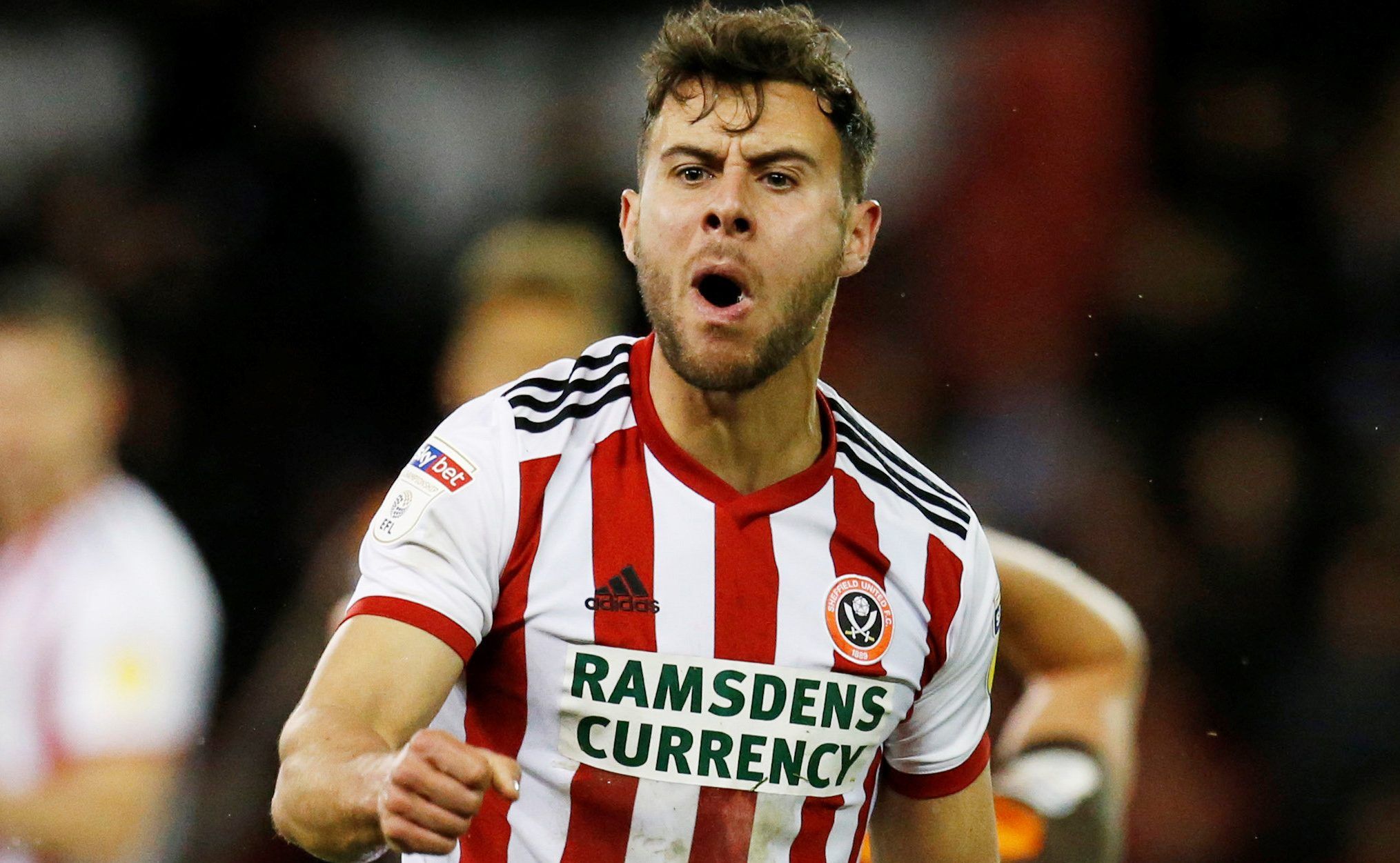 Soccer Football - Championship - Sheffield United v Brentford - Bramall Lane, Sheffield, Britain - March 12, 2019  Sheffield United's George Baldock celebrates being awarded a penalty  Action Images/Ed Sykes  EDITORIAL USE ONLY. No use with unauthorized audio, video, data, fixture lists, club/league logos or 