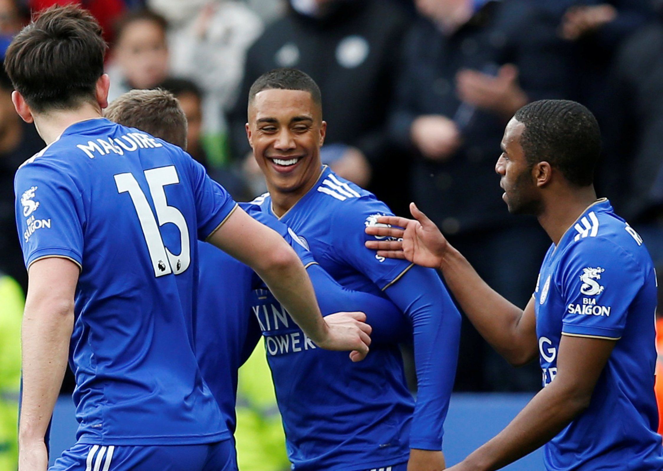 Youri Tielemans celebrates a goal with his Leicester team mates. 