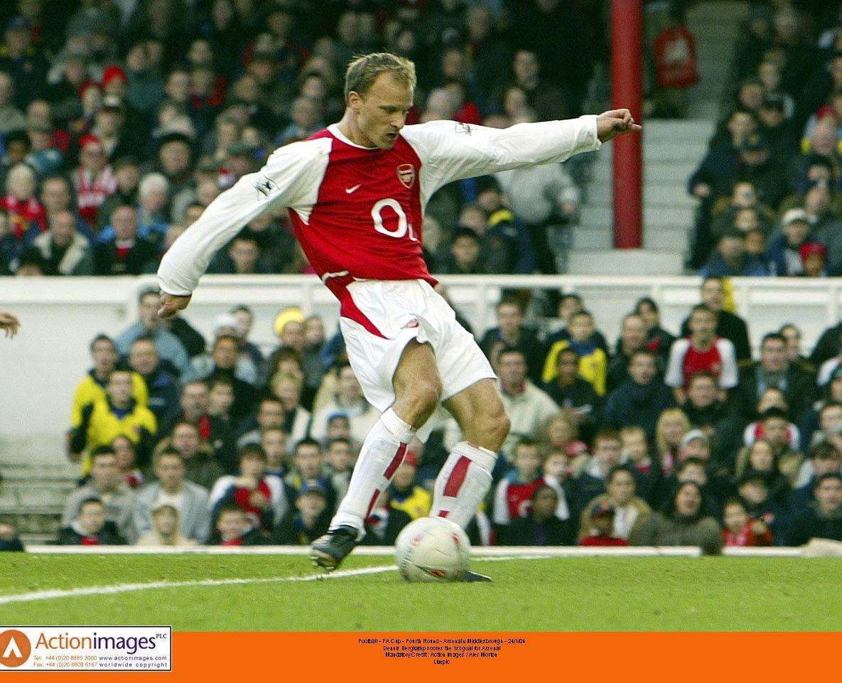 Dennis Bergkamp shoots for Arsenal 