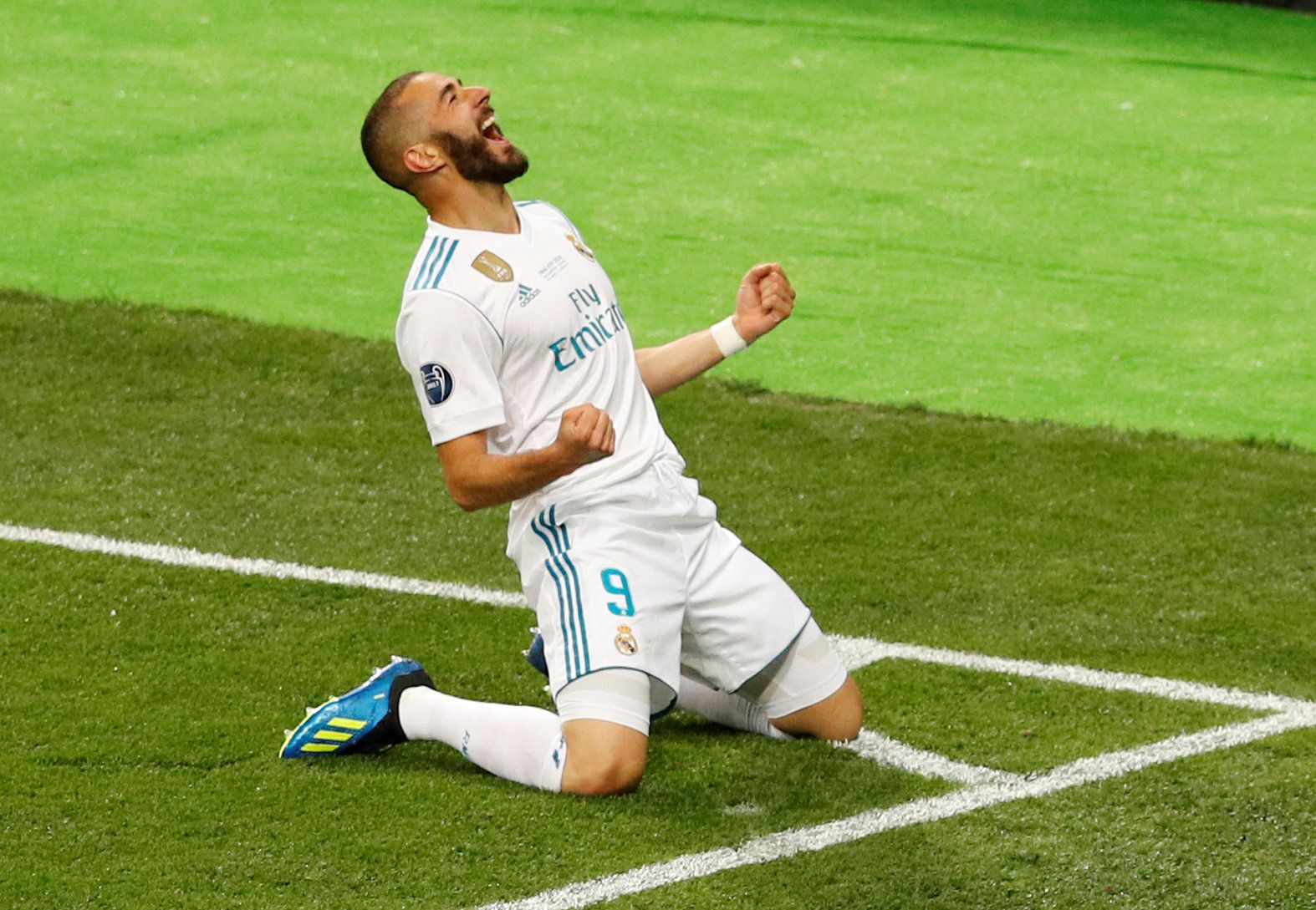 Soccer Football - Champions League Final - Real Madrid v Liverpool - NSC Olympic Stadium, Kiev, Ukraine - May 26, 2018   Real Madrid's Karim Benzema celebrates scoring their first goal    REUTERS/Phil Noble