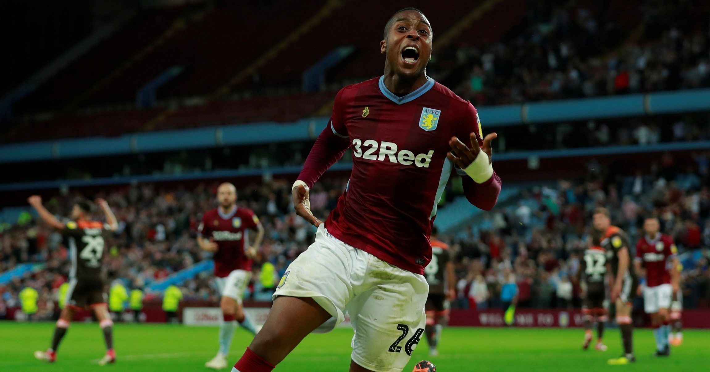 Kodjia celebrates scoring for Aston Villa.