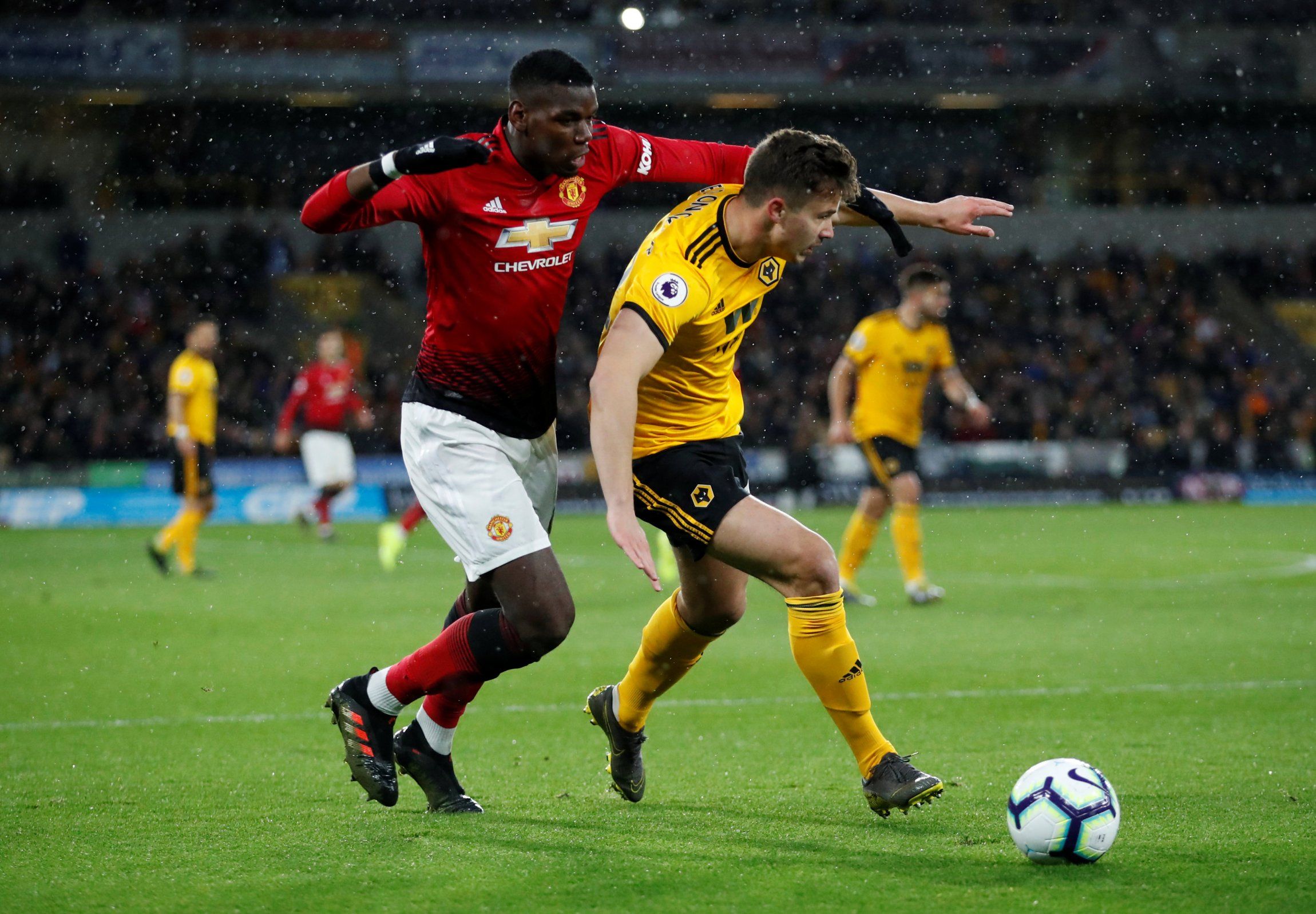 Leander Dendoncker is challenged by Paul Pogba.