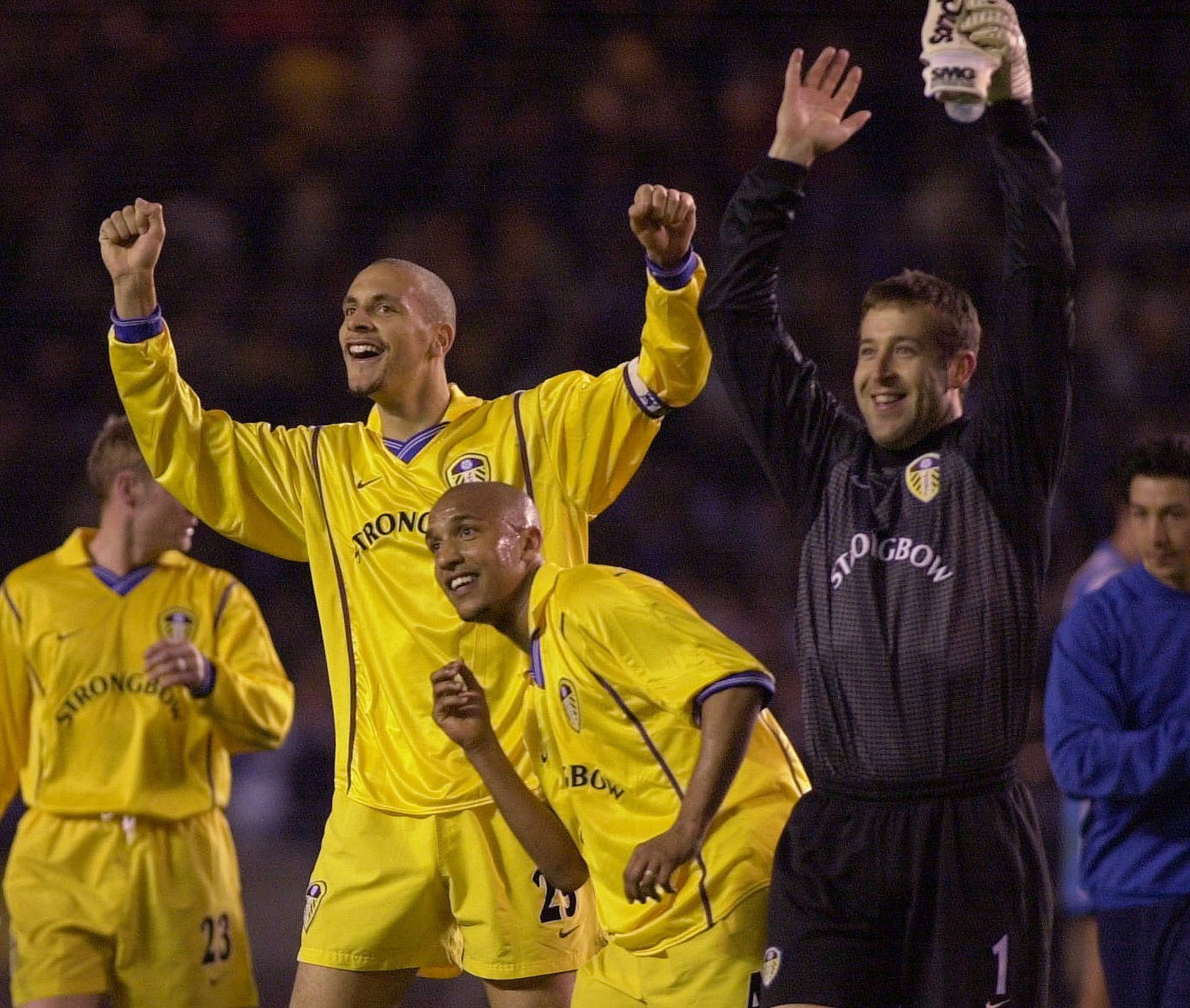 Leeds United's Rio Ferdinand (L) Olivier Dacourt (C) and goalkeeper Nigel Martyn celebrate after their match against Deportivo La Coruna in the Champions League quarter-final at the Estadio Municipal De Riazor April 17, 2001. Leeds United lost the match 2-0 but advanced to the Champions League semifinal with a 3-2 aggrigate win over Deportivo Coruna.

DC/AA