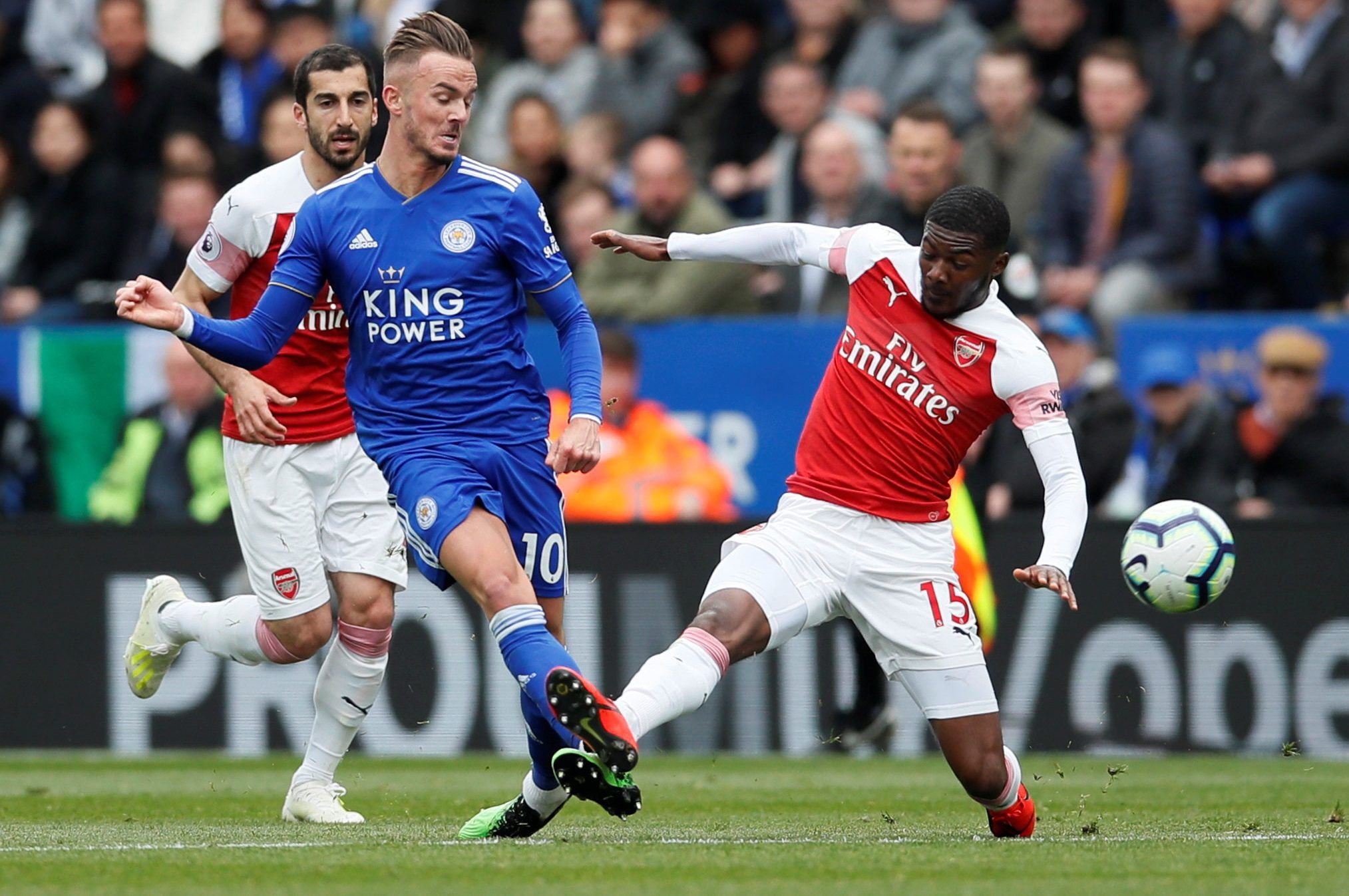James Maddison is challenged by Ainsley Maitland-Niles.