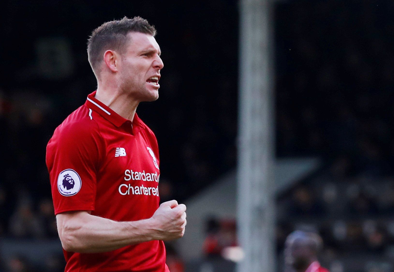 Soccer Football - Premier League - Fulham v Liverpool - Craven Cottage, London, Britain - March 17, 2019  Liverpool's James Milner celebrates scoring their second goal from the penalty spot          Action Images via Reuters/Andrew Couldridge  EDITORIAL USE ONLY. No use with unauthorized audio, video, data, fixture lists, club/league logos or 