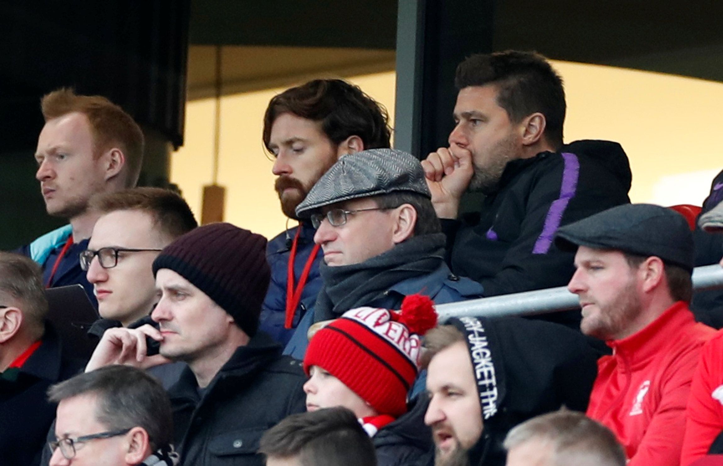 Tottenham manager Mauricio Pochettino looks on from the Anfield stands