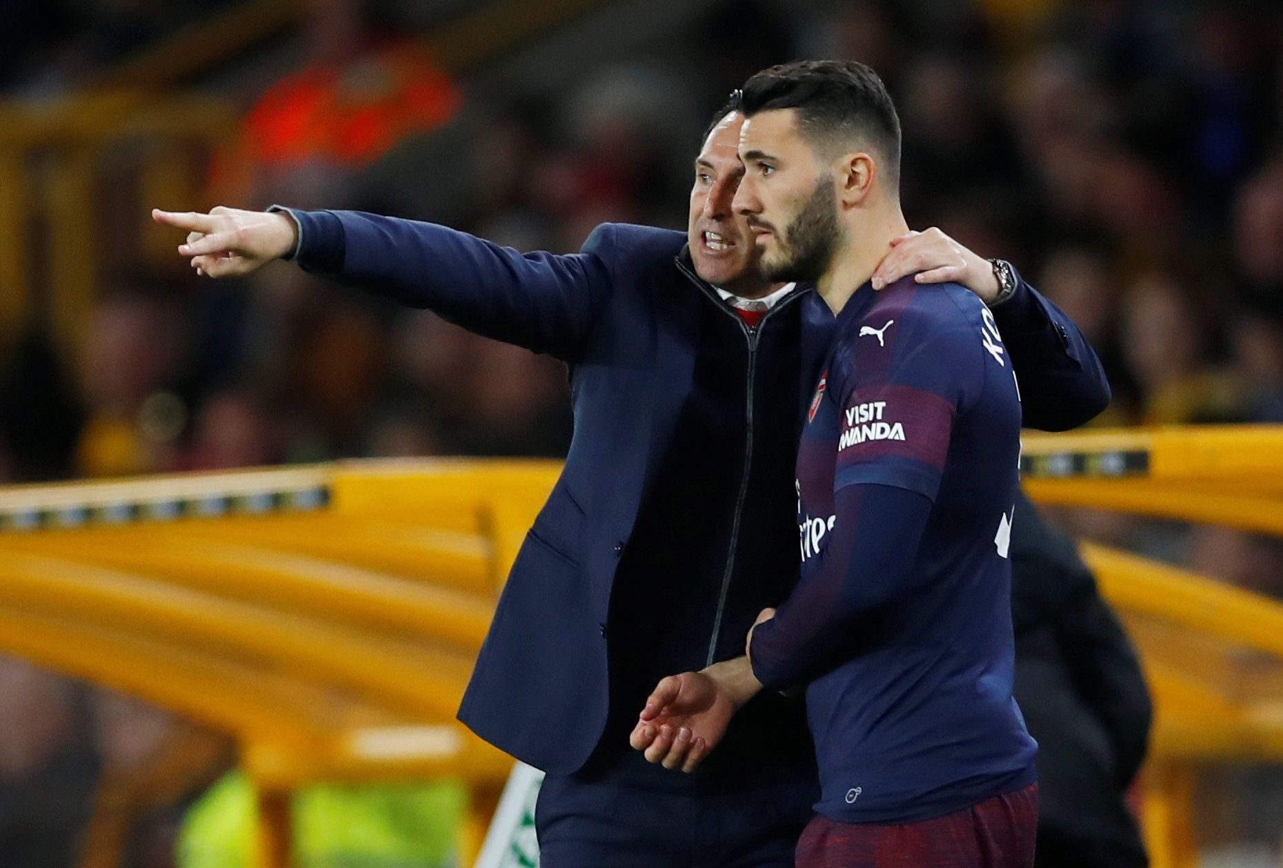 Soccer Football - Wolverhampton Wanderers v Arsenal - Molineux Stadium, Wolverhampton, Britain - April 24, 2019  Arsenal manager Unai Emery talks to Sead Kolasinac   REUTERS/Eddie Keogh  EDITORIAL USE ONLY. No use with unauthorized audio, video, data, fixture lists, club/league logos or 