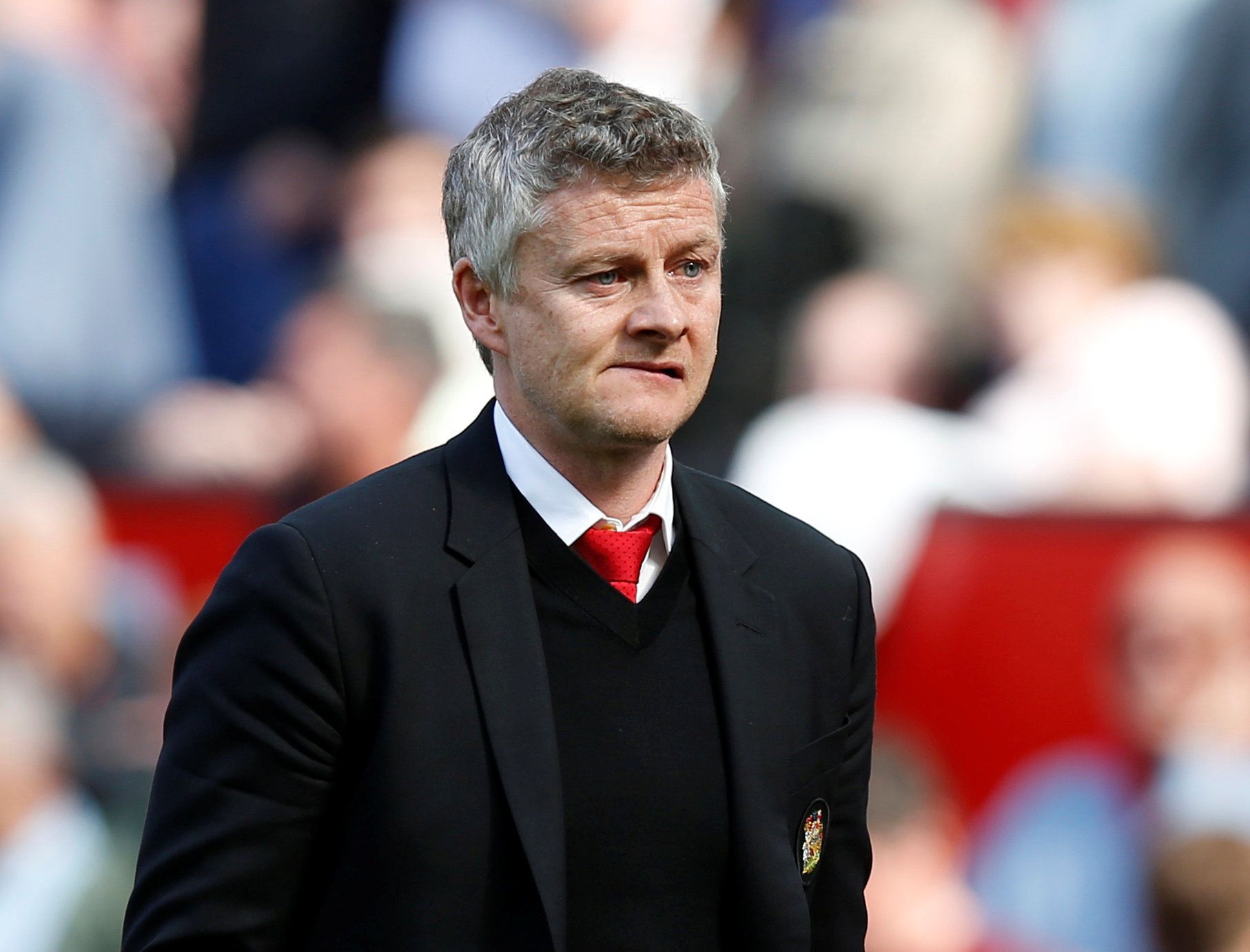 Soccer Football - Premier League - Manchester United v Cardiff City - Old Trafford, Manchester, Britain - May 12, 2019  Manchester United manager Ole Gunnar Solskjaer reacts during the match      REUTERS/Andrew Yates  EDITORIAL USE ONLY. No use with unauthorized audio, video, data, fixture lists, club/league logos or "live" services. Online in-match use limited to 75 images, no video emulation. No use in betting, games or single club/league/player publications.  Please contact your account repre