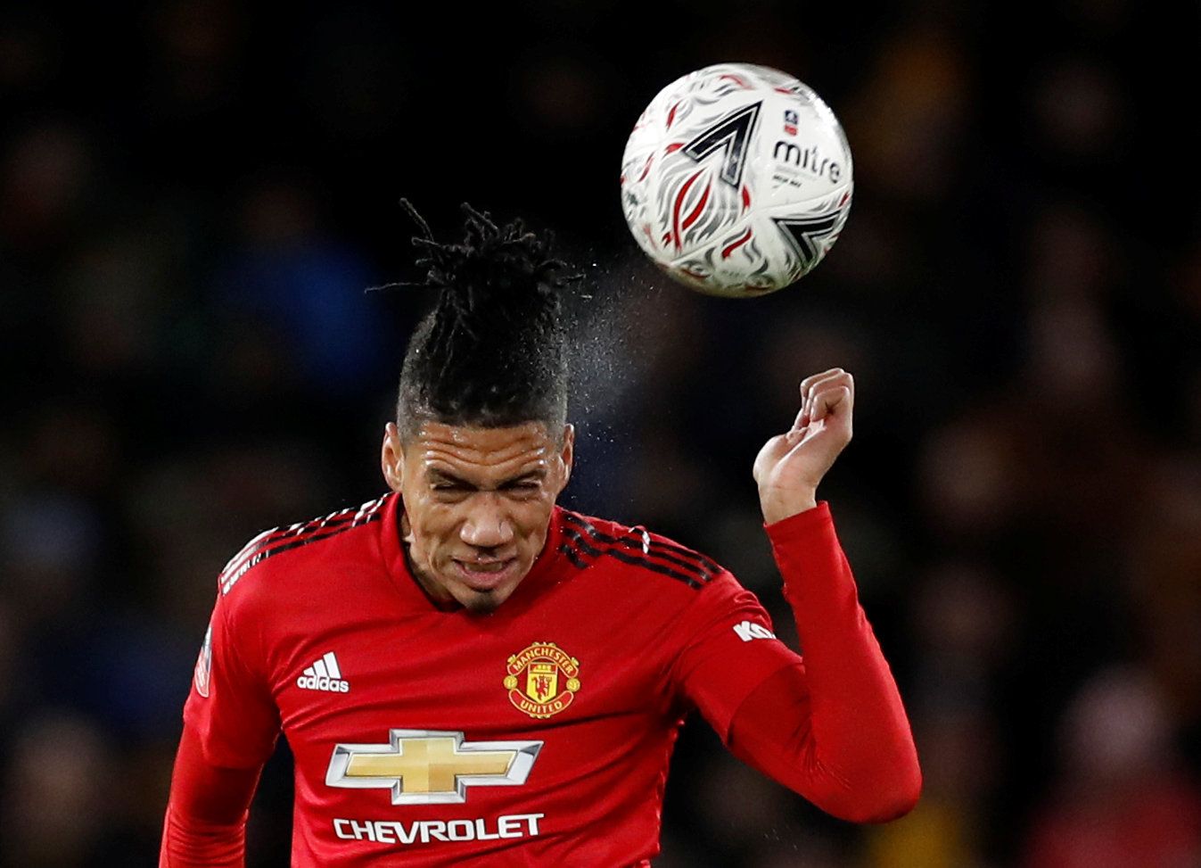 Soccer Football - FA Cup Quarter Final - Wolverhampton Wanderers v Manchester United - Molineux Stadium, Wolverhampton, Britain - March 16, 2019   Manchester United's Chris Smalling heads the ball    Action Images via Reuters/Carl Recine