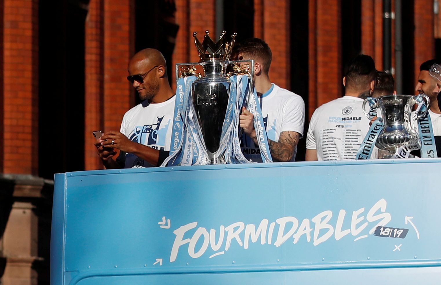 Soccer Football - Manchester City Premier League Title Winners Parade - Manchester, Britain - May 20, 2019   Manchester City's Vincent Kompany during the parade   Action Images via Reuters/Carl Recine