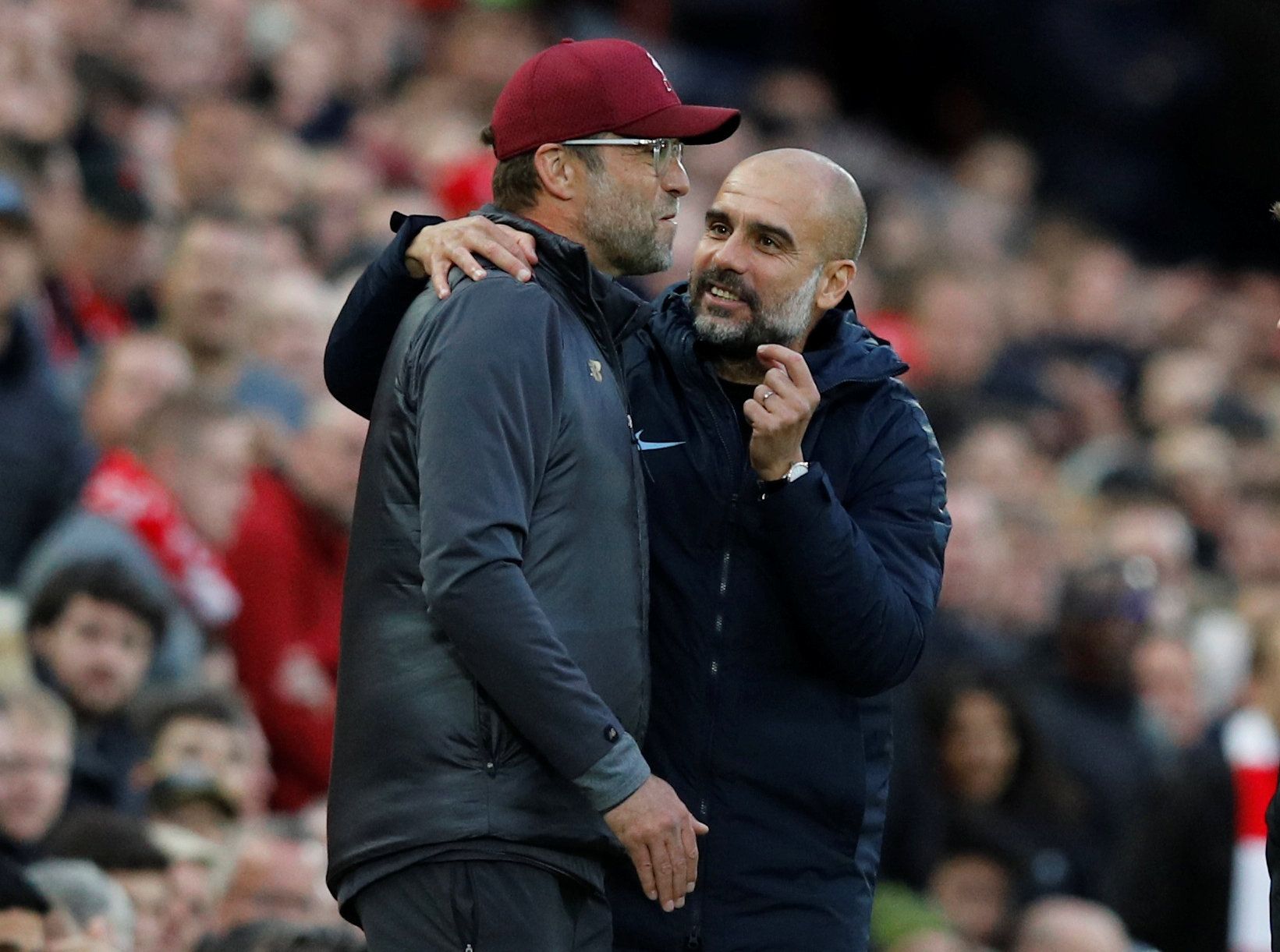 Soccer Football - Premier League - Liverpool v Manchester City - Anfield, Liverpool, Britain - October 7, 2018  Liverpool manager Juergen Klopp with Manchester City manager Pep Guardiola during the match                 REUTERS/Phil Noble  EDITORIAL USE ONLY. No use with unauthorized audio, video, data, fixture lists, club/league logos or 