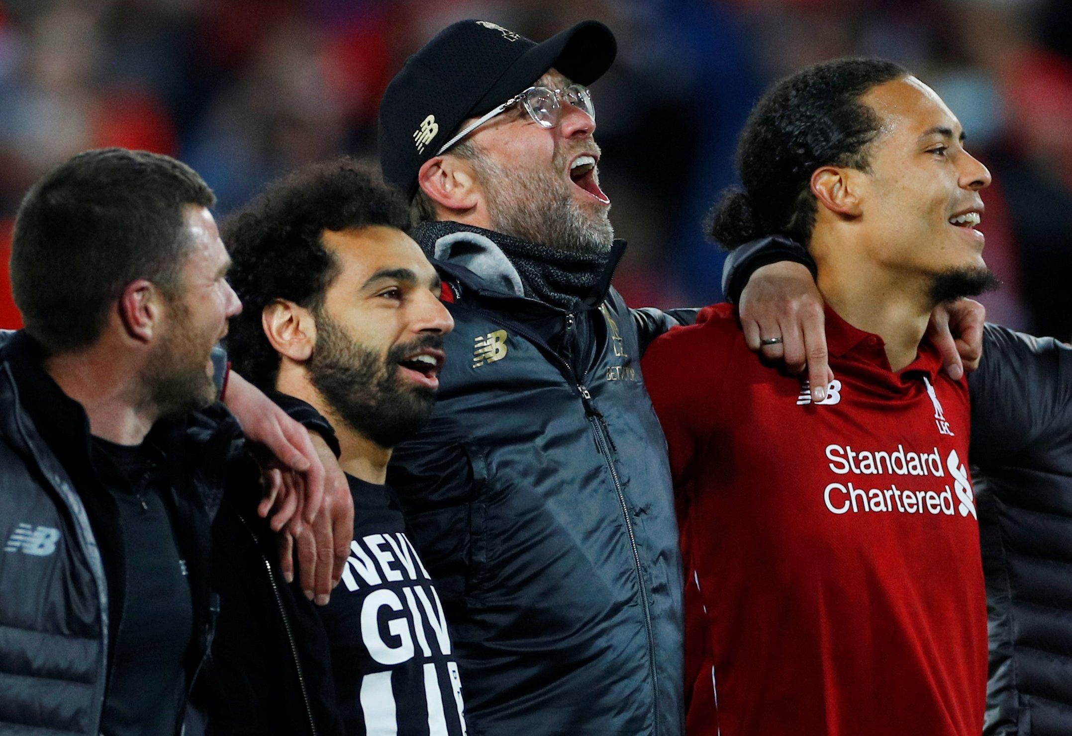 Soccer Football - Champions League Semi Final Second Leg - Liverpool v FC Barcelona - Anfield, Liverpool, Britain - May 7, 2019  Liverpool's Mohamed Salah, manager Juergen Klopp and Virgil van Dijk celebrate in front of their fans after the match   REUTERS/Phil Noble