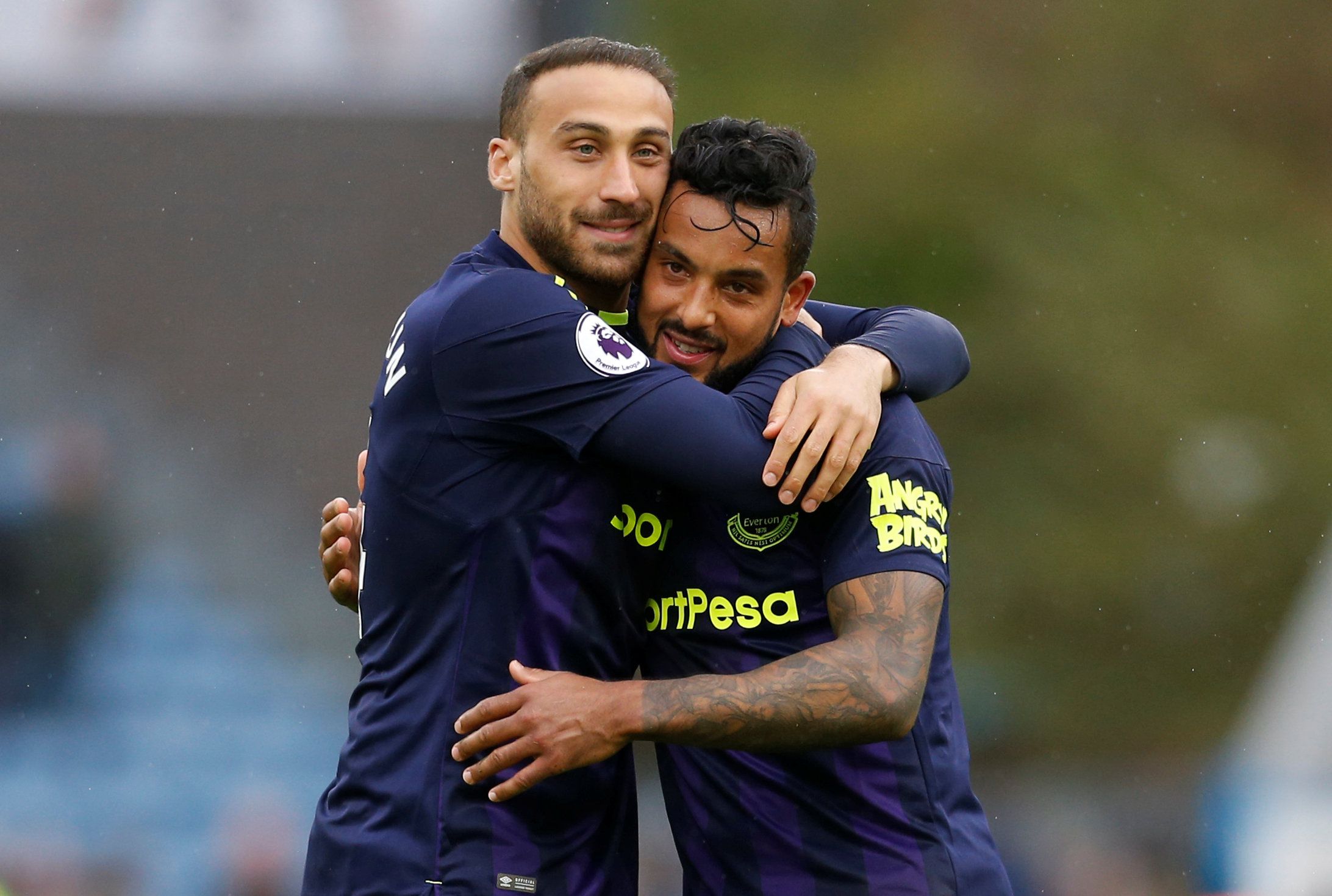 Soccer Football - Premier League - Huddersfield Town v Everton - John Smith's Stadium, Huddersfield, Britain - April 28, 2018   Everton's Theo Walcott and Cenk Tosun celebrate after the match                     Action Images via Reuters/Ed Sykes    EDITORIAL USE ONLY. No use with unauthorized audio, video, data, fixture lists, club/league logos or 