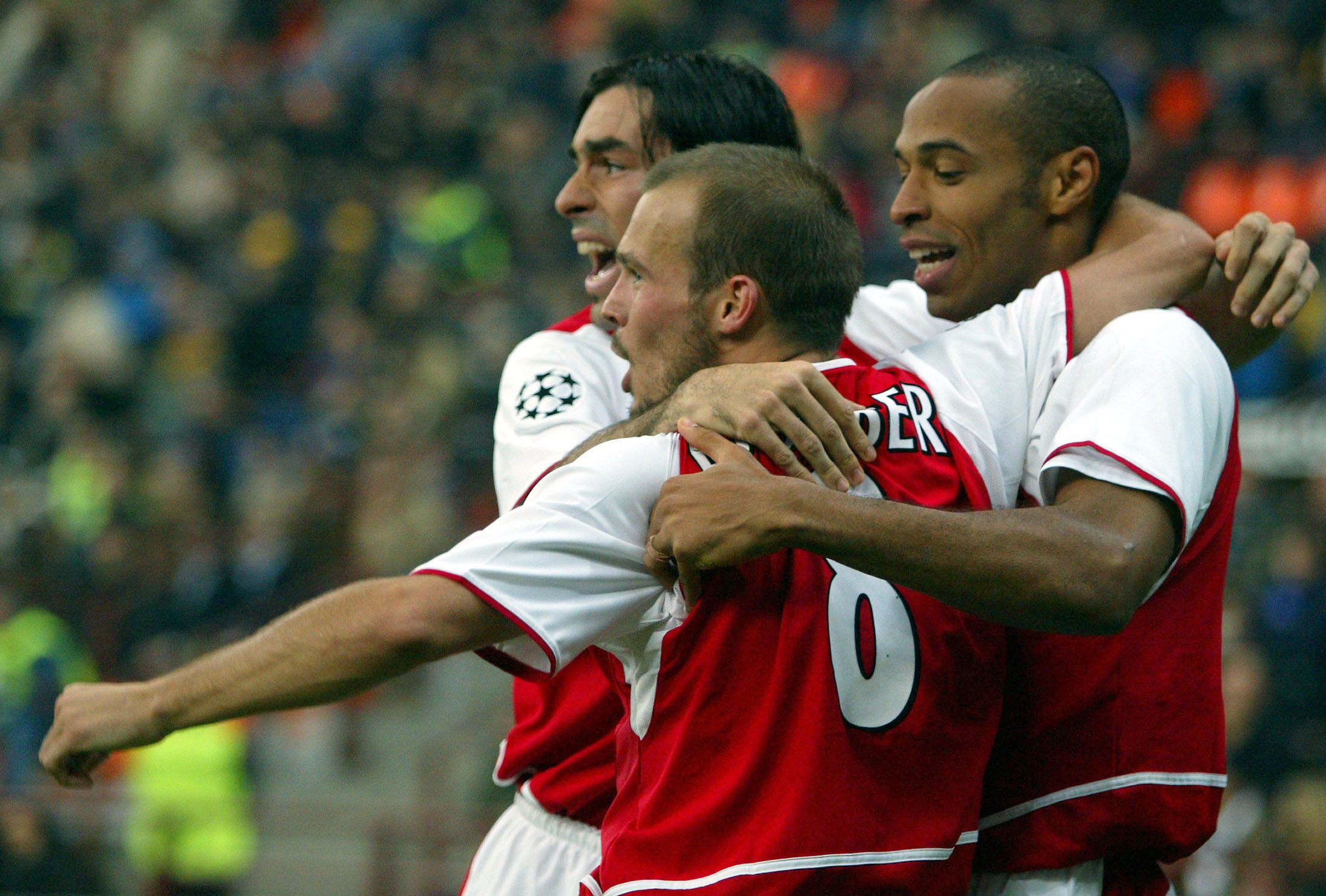 Arsenal's Fredrik Ljungberg (C) celebrates with team mates Robert Pires
(L) and Thierry Henry after scoring against Inter Milan during their
Champions League Group B first phase match at the San Siro Stadium in
Milan, November 25, 2003. REUTERS/Stefano Rellandini

SR/WS