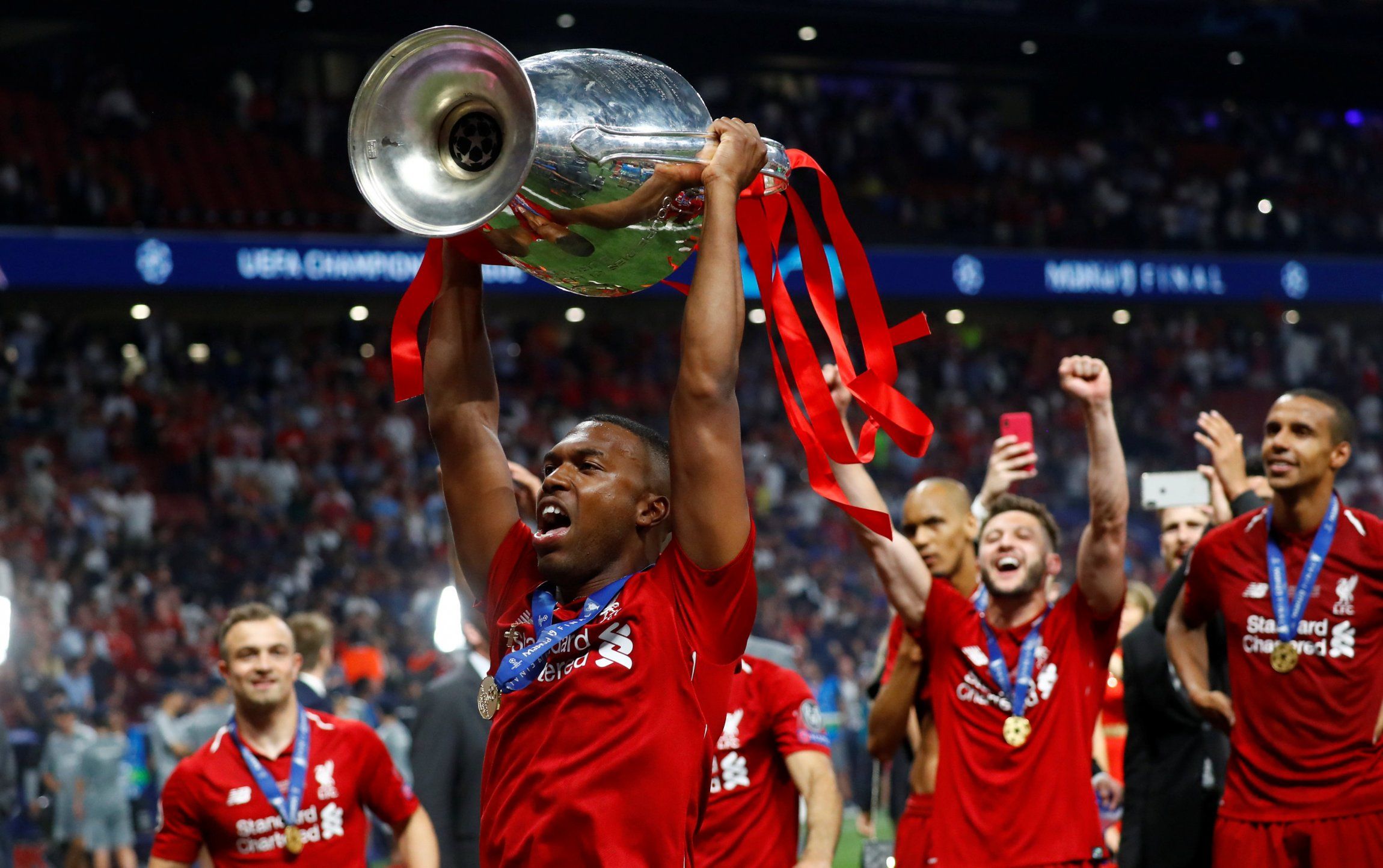 Sturridge celebrates winning the Champions League with Liverpool