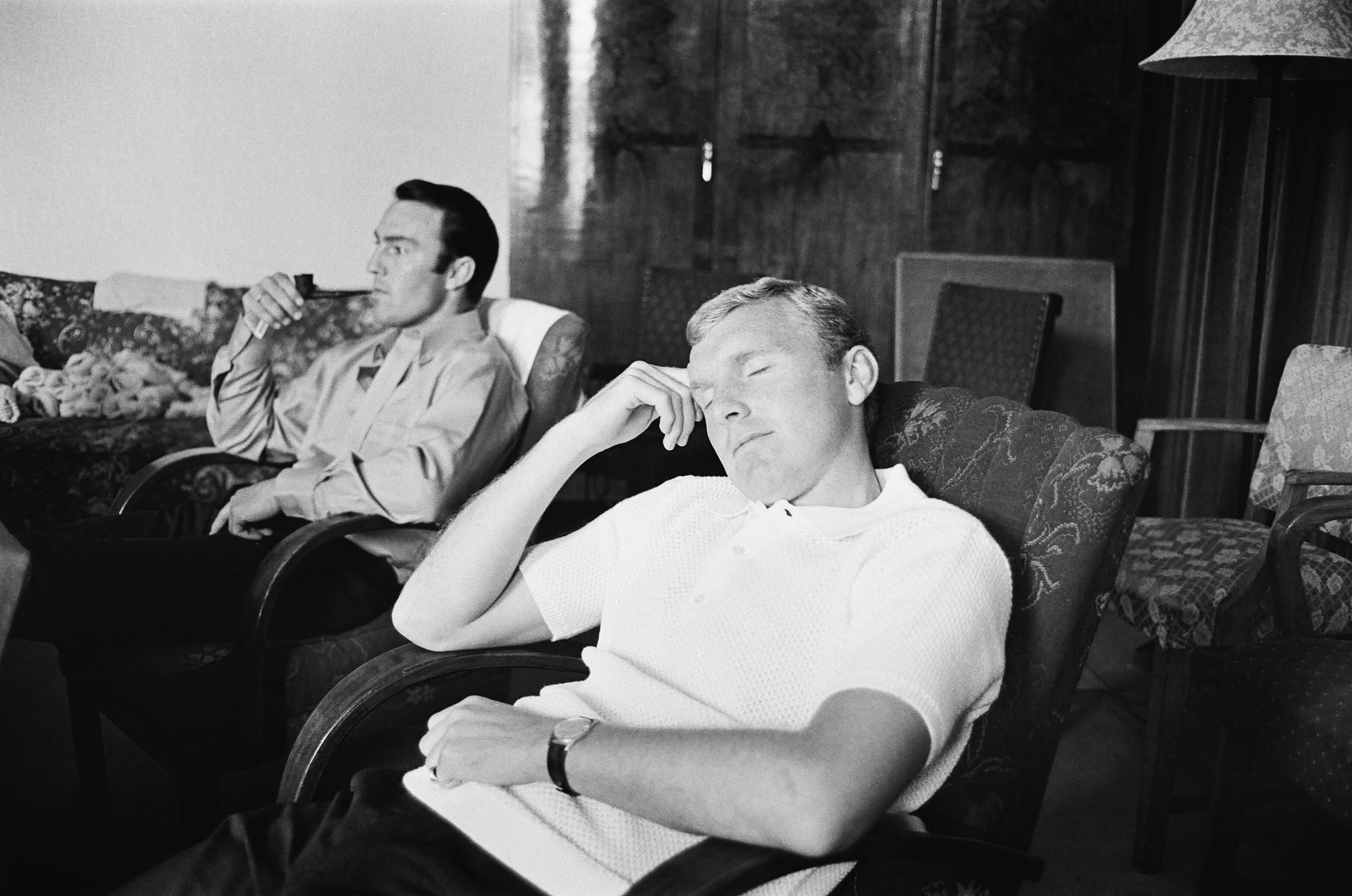 1966 World Cup
The England squad at their base in Hendon where they stayed throughout the tournament.
Striker Jimmy Greaves (left) smokes a pipe while captain Bobby Moore has a nap.
July 1966.