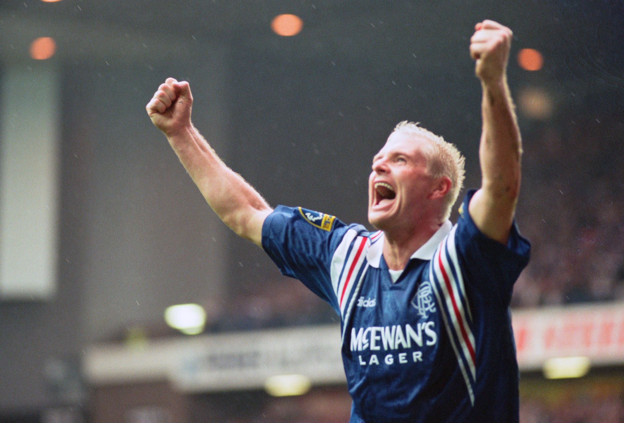 Rangers football player Paul Gascoigne, arms raised in joy after scoring a goal in their 2-0 victory over Celtic in the Scottish Premier League old firm match at Ibrox.
28th September 1996.