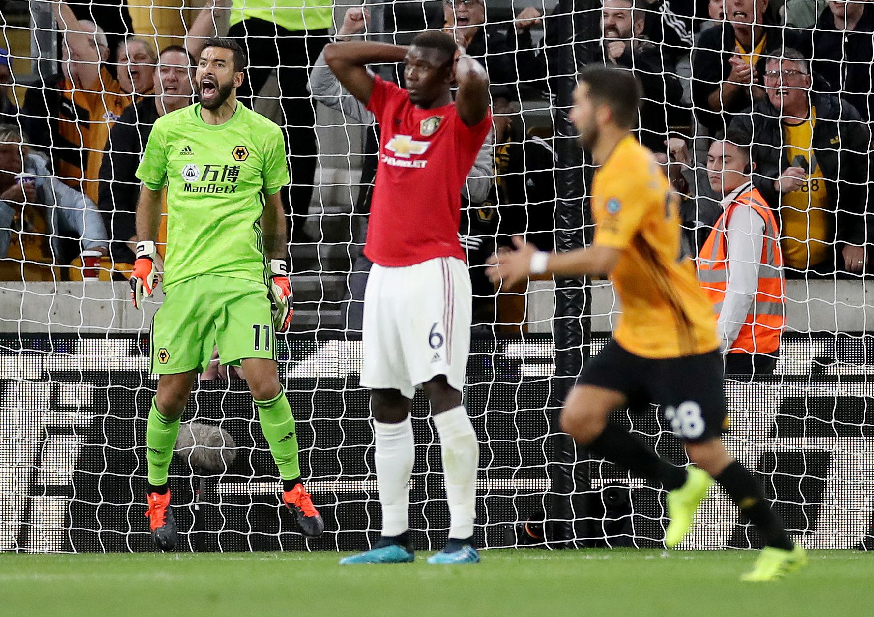 Soccer Football - Premier League - Wolverhampton Wanderers v Manchester United - Molineux Stadium, Wolverhampton, Britain - August 19, 2019   Manchester United's Paul Pogba reacts after his penalty is saved by Wolverhampton Wanderers' Rui Patricio    Action Images via Reuters/Carl Recine    EDITORIAL USE ONLY. No use with unauthorized audio, video, data, fixture lists, club/league logos or 