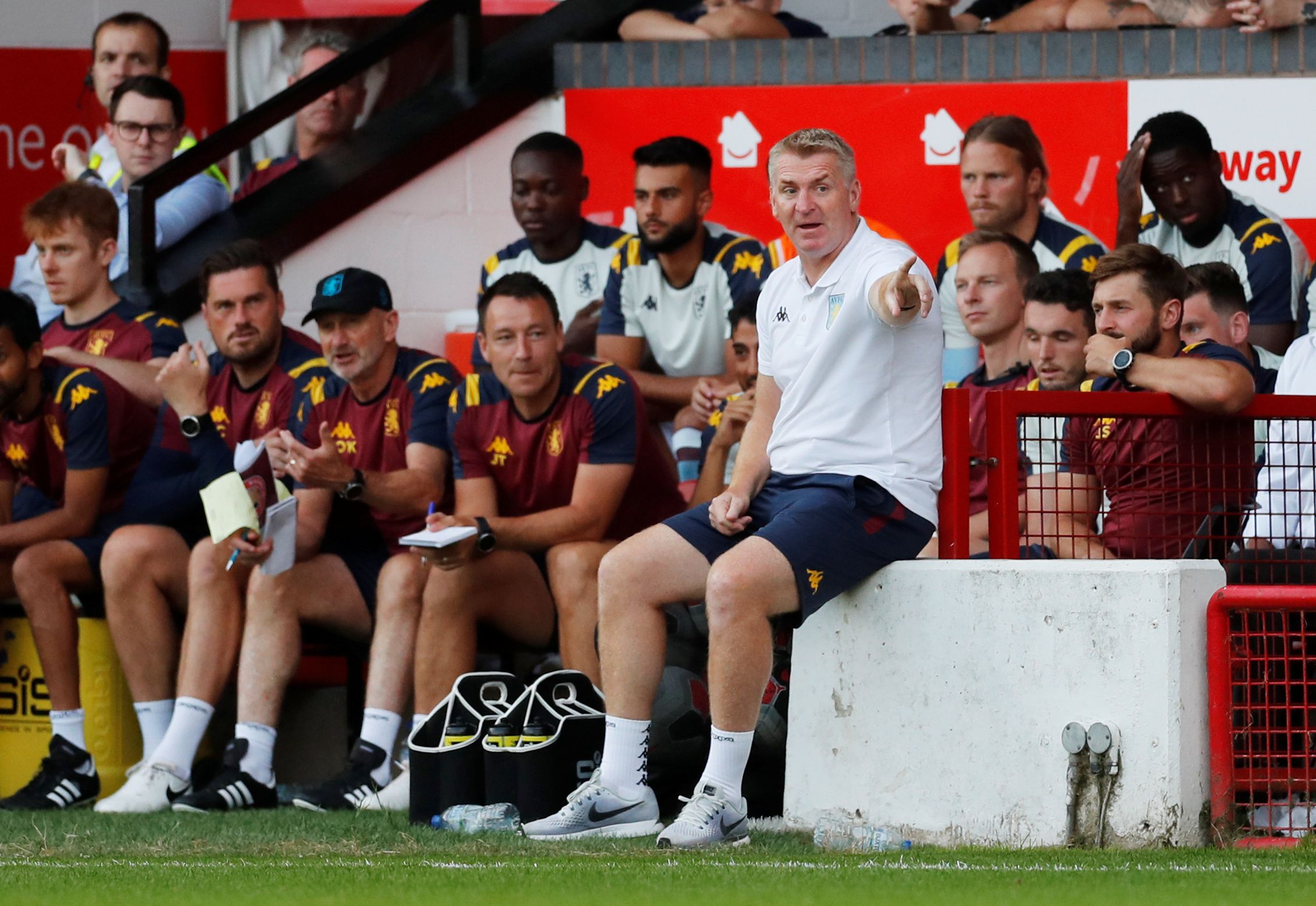 Soccer Football - Pre Season Friendly - Walsall v Aston Villa - Banks's Stadium, Walsall, Britain - July 24, 2019   Aston Villa manager Dean Smith as assistant manager John Terry and coaching staff look on   Action Images via Reuters/Matthew Childs