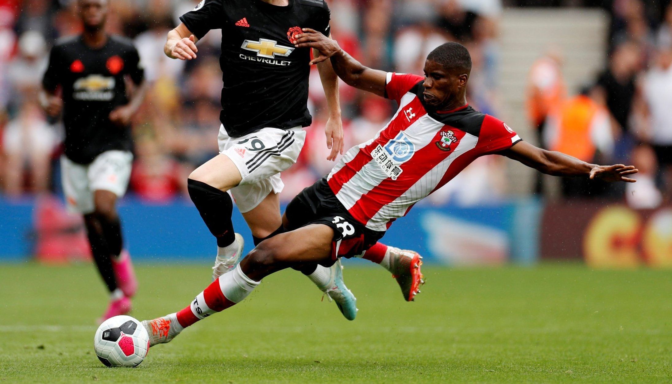 Kevin Danso tackling against Scott McTominay